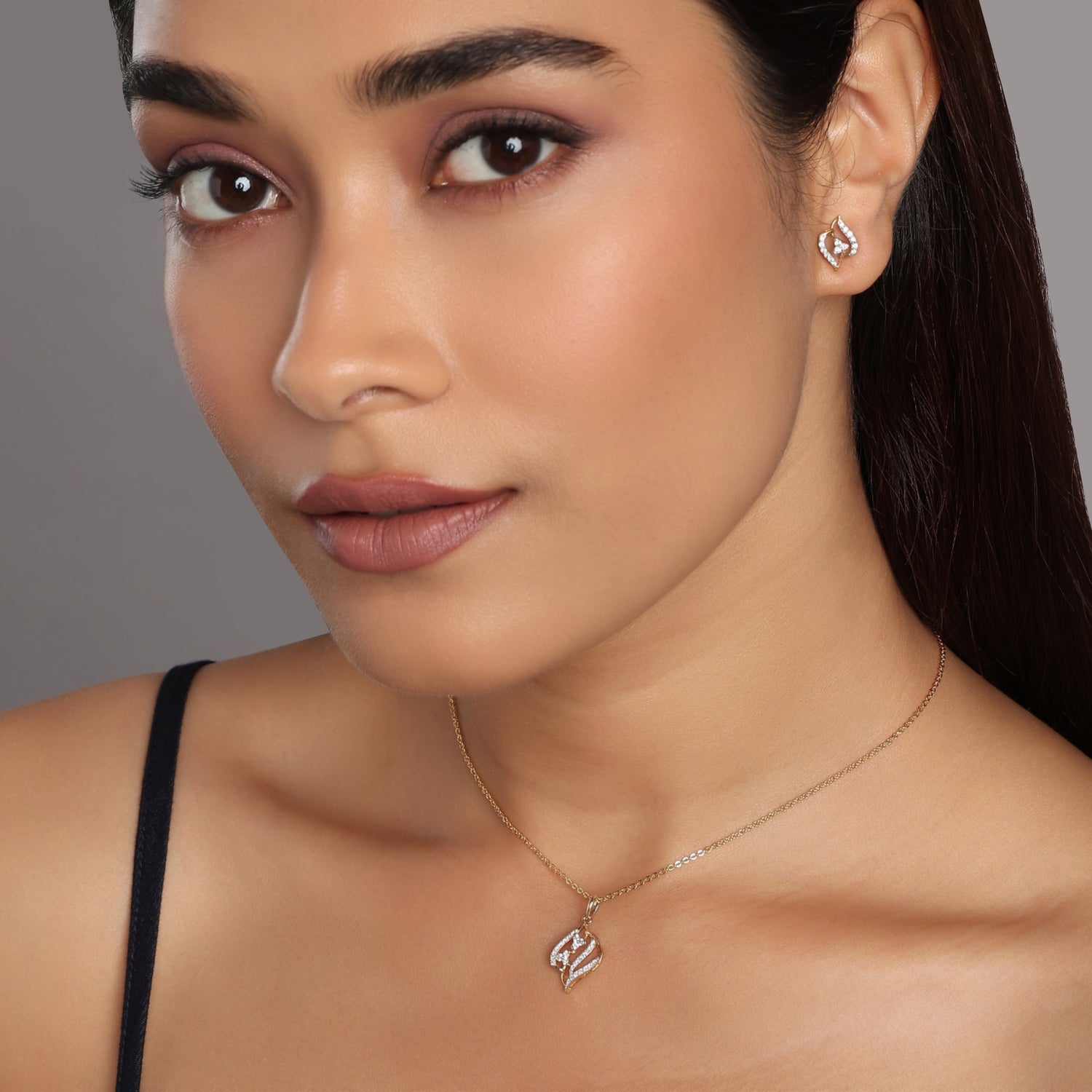 Graceful Leaf Motif Pendant and Shimmering Stud Earring Set