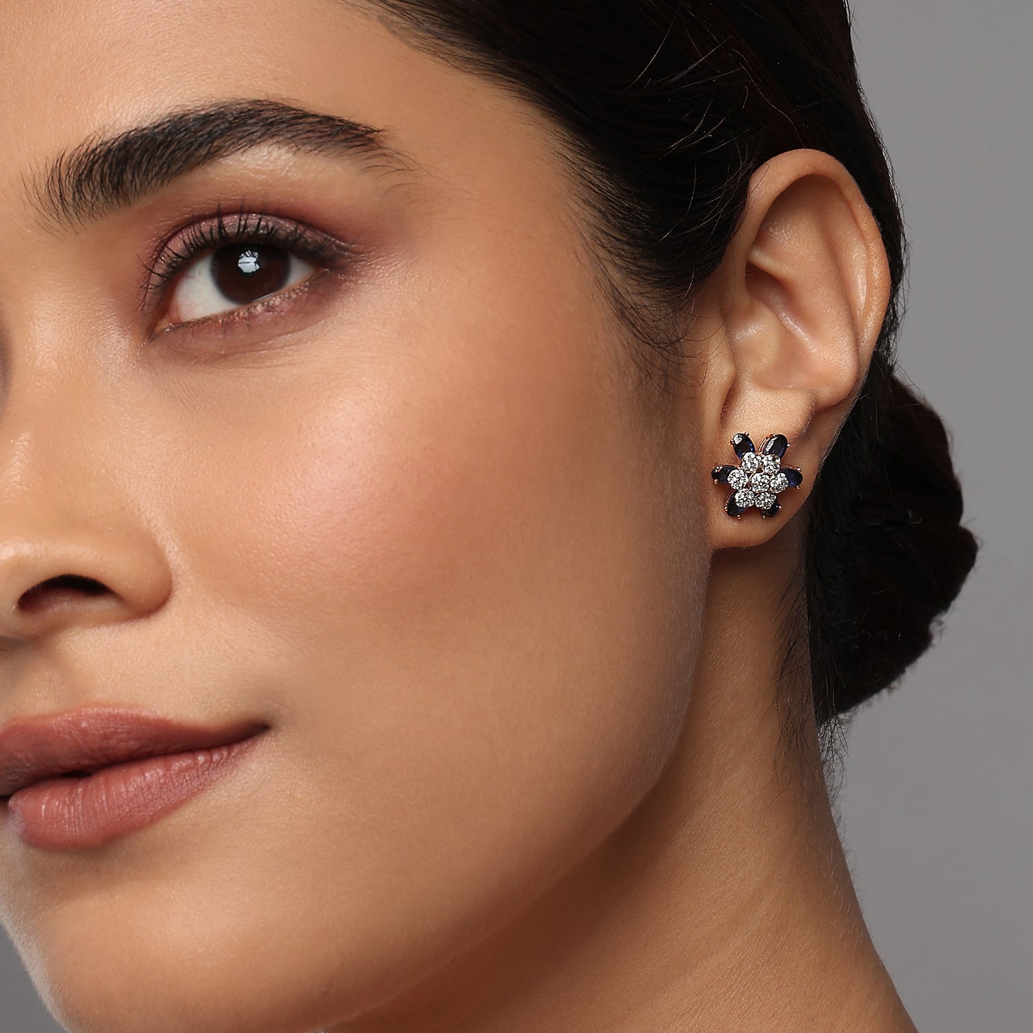 Radiant Floral Starburst Stud Earrings With Shimmering Pave Clusters And Petals