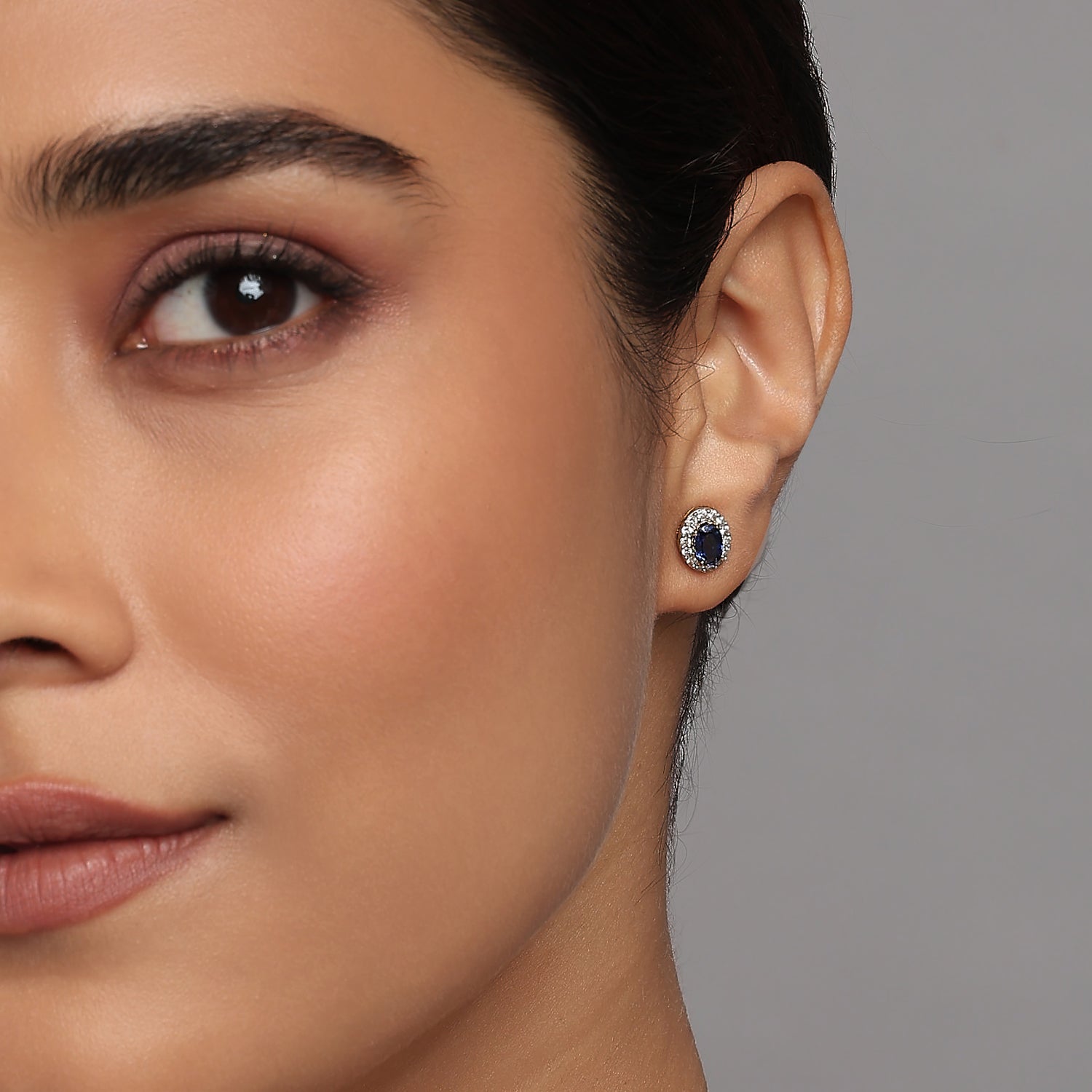 Enchanting Oval Halo Stud Earrings With Radiant Deep Blue Centers