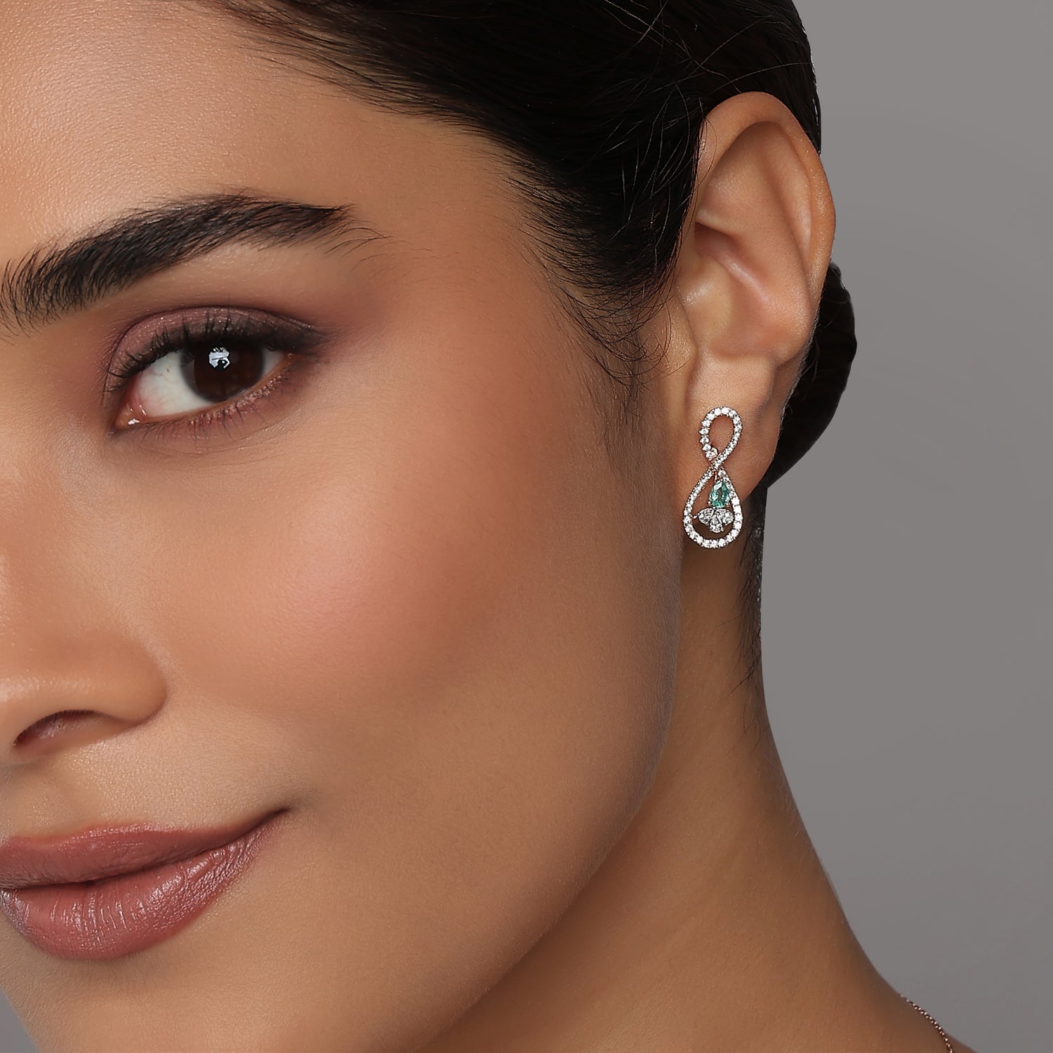 Enchanting Infinity Drop Earrings With Radiant Pear Cut Center Stones