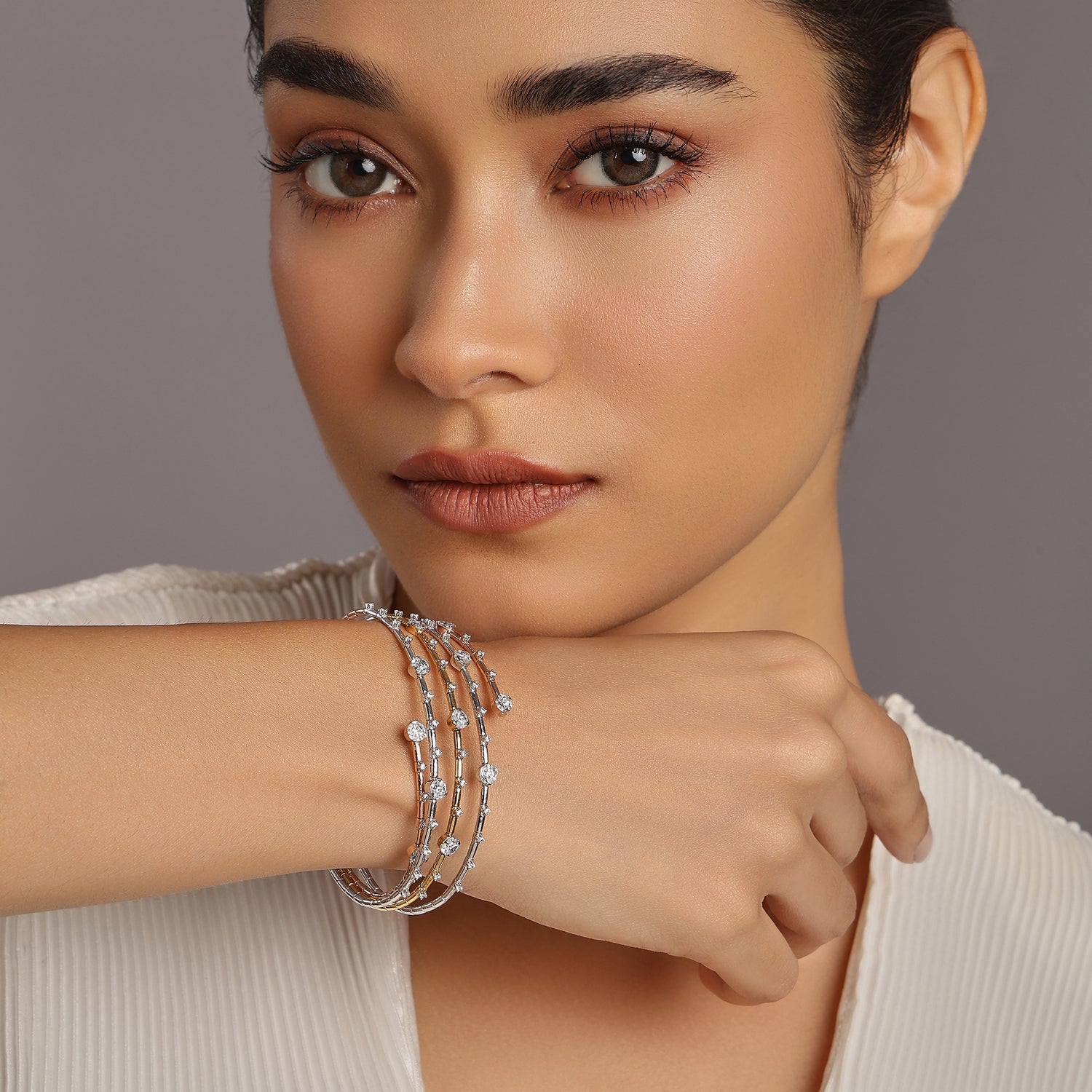 Elegant Textured Bangle Set with Delicate Stone Detailing