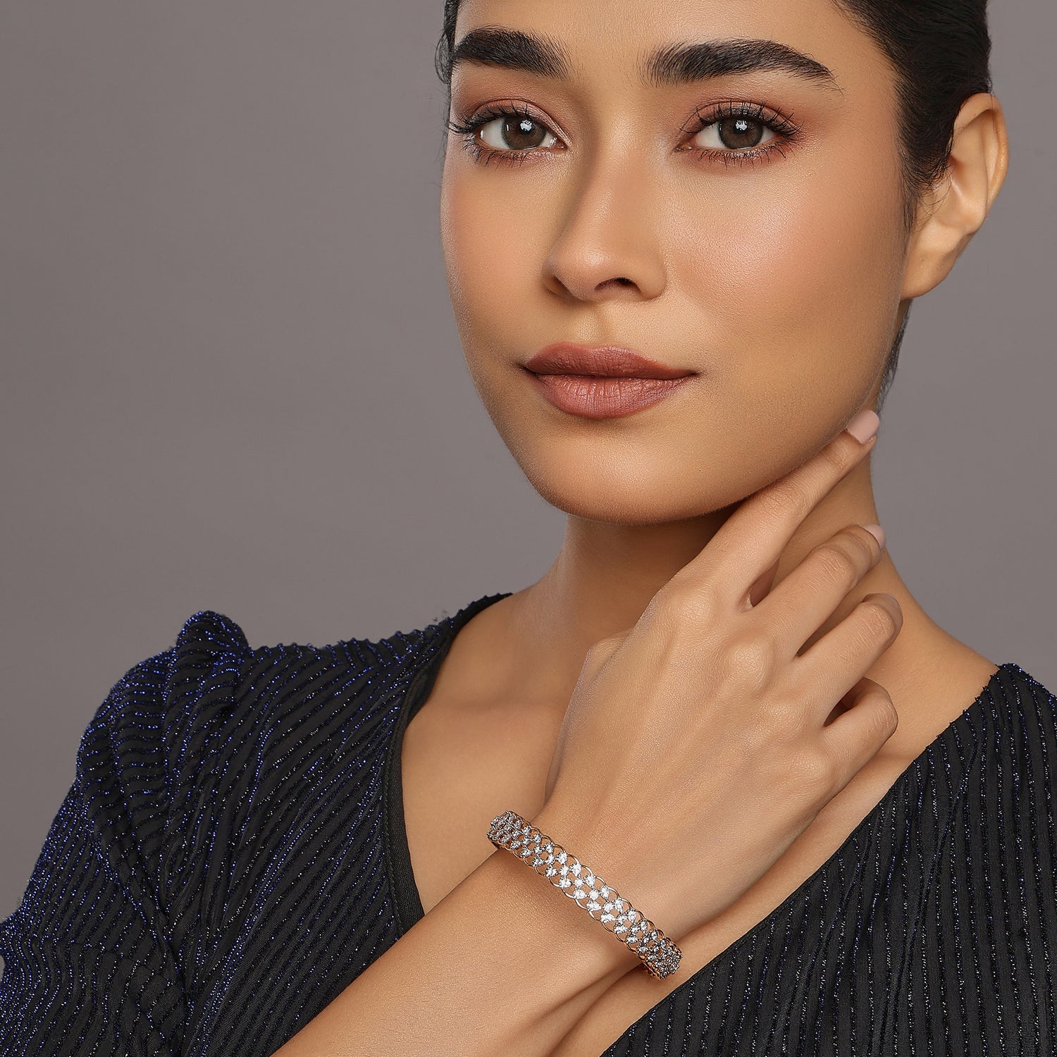 Intricate Interwoven Mesh Bangle with Sparkling Stone Detailing