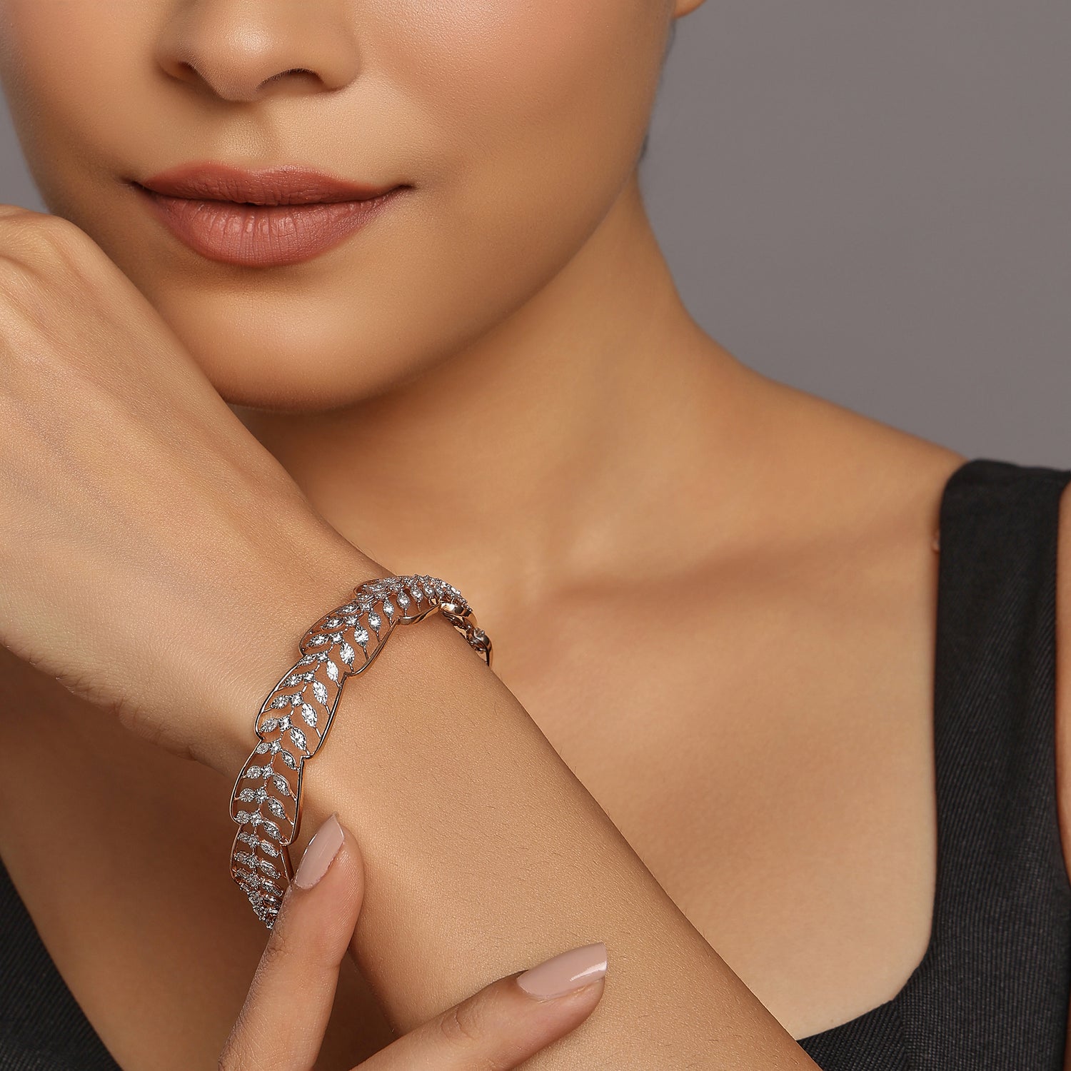 Luxurious Leaf Motif Bangle with Interwoven Sparkling Detailing