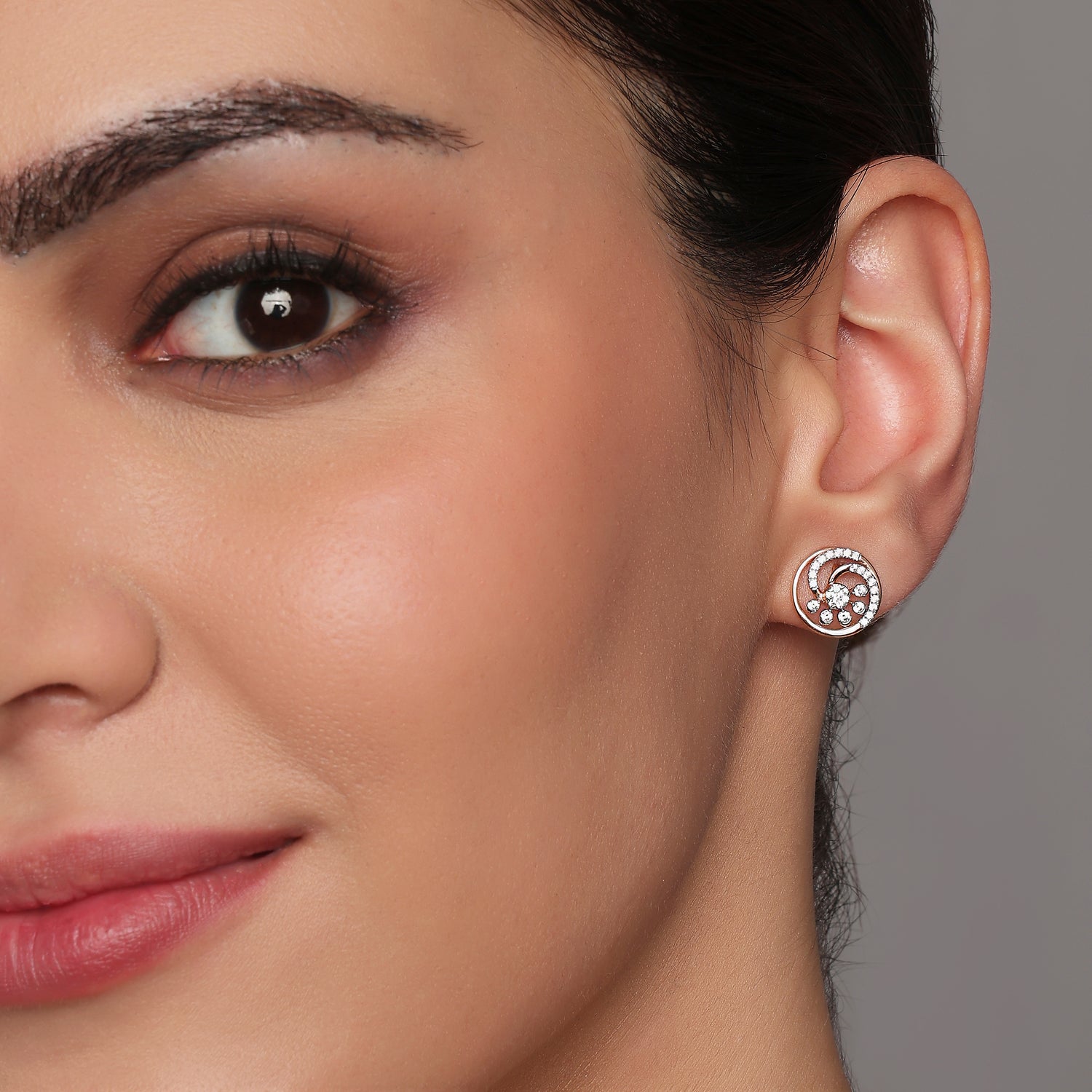Spiral Round Stud Earrings with Radiant Detailing