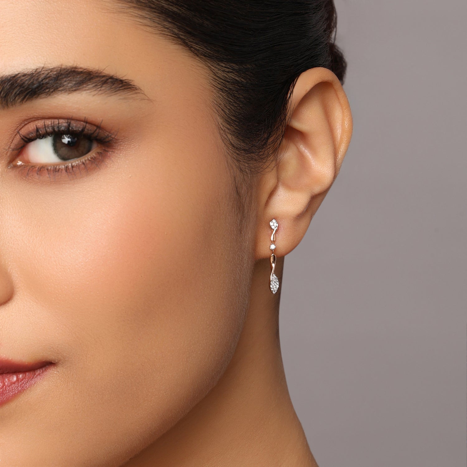 Elegant Twist Drop Earrings with Leaf Motif