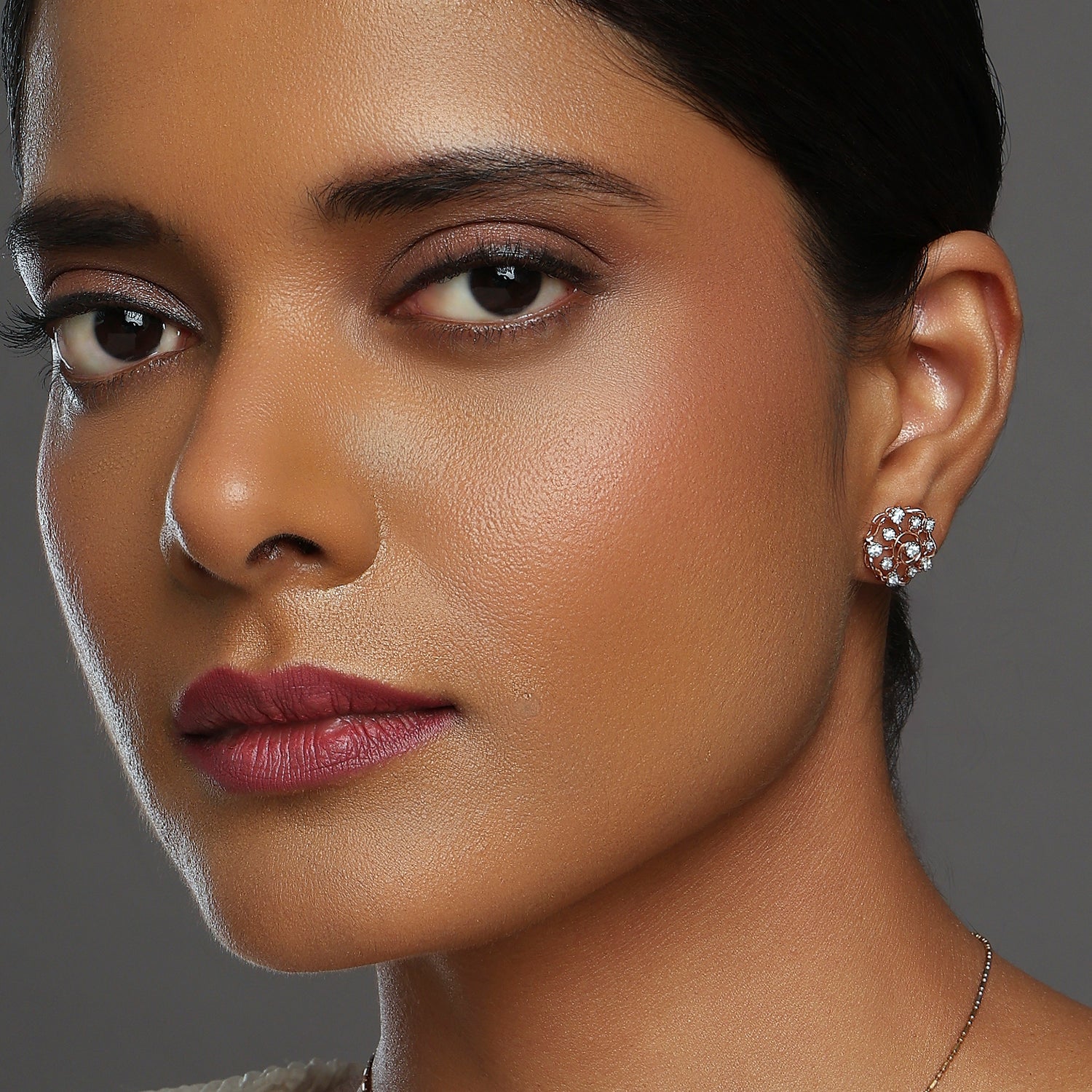 Elegant Spiral Halo Stud Earrings with Radiant Detailing
