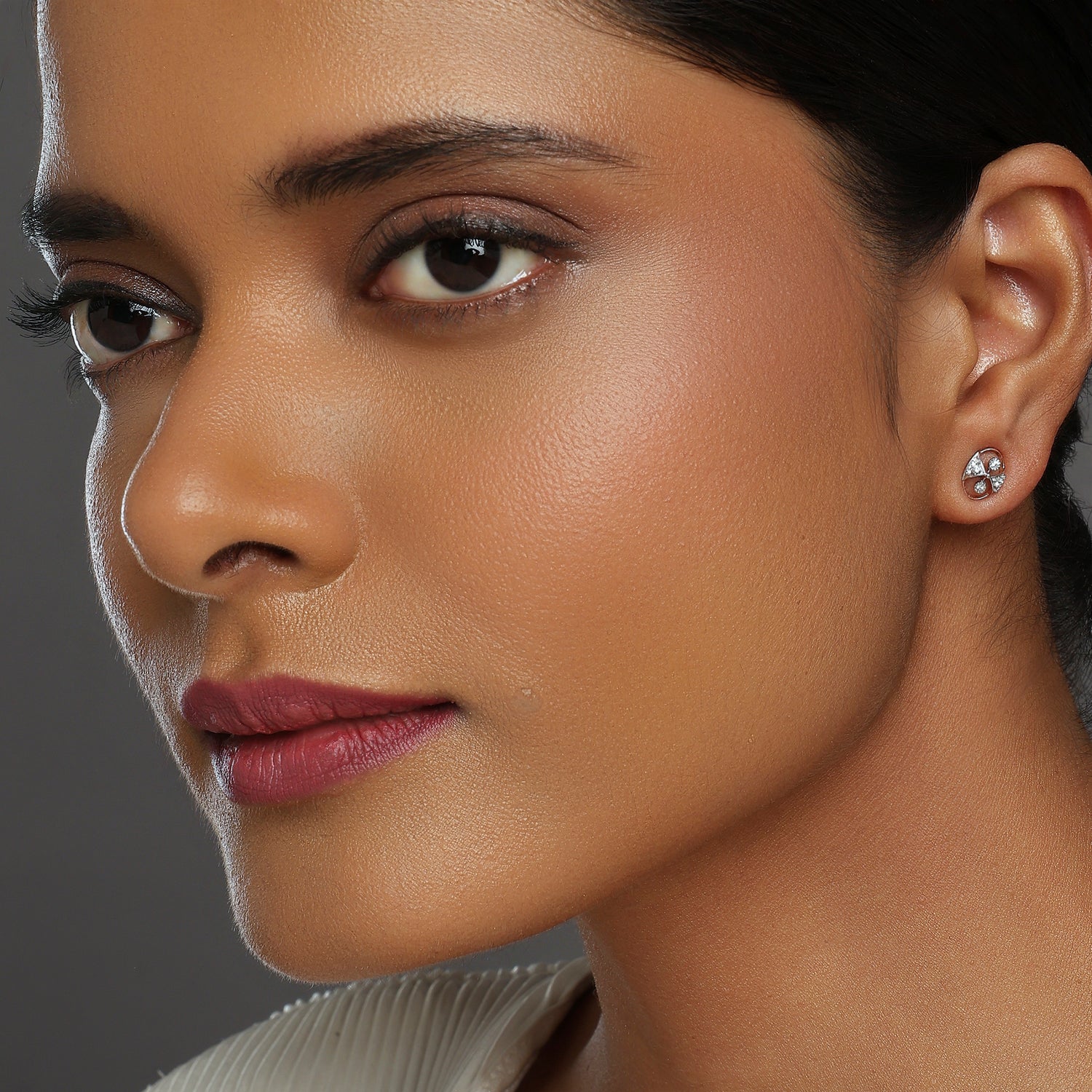 Oval Infinity Stud Earrings with Dual Accent Design