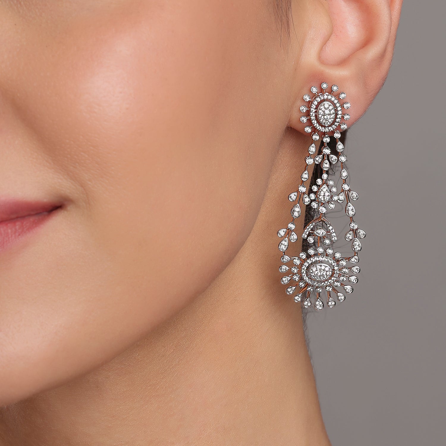 Celestial Cascade Chandelier Earrings with Radiant Sunburst Motifs