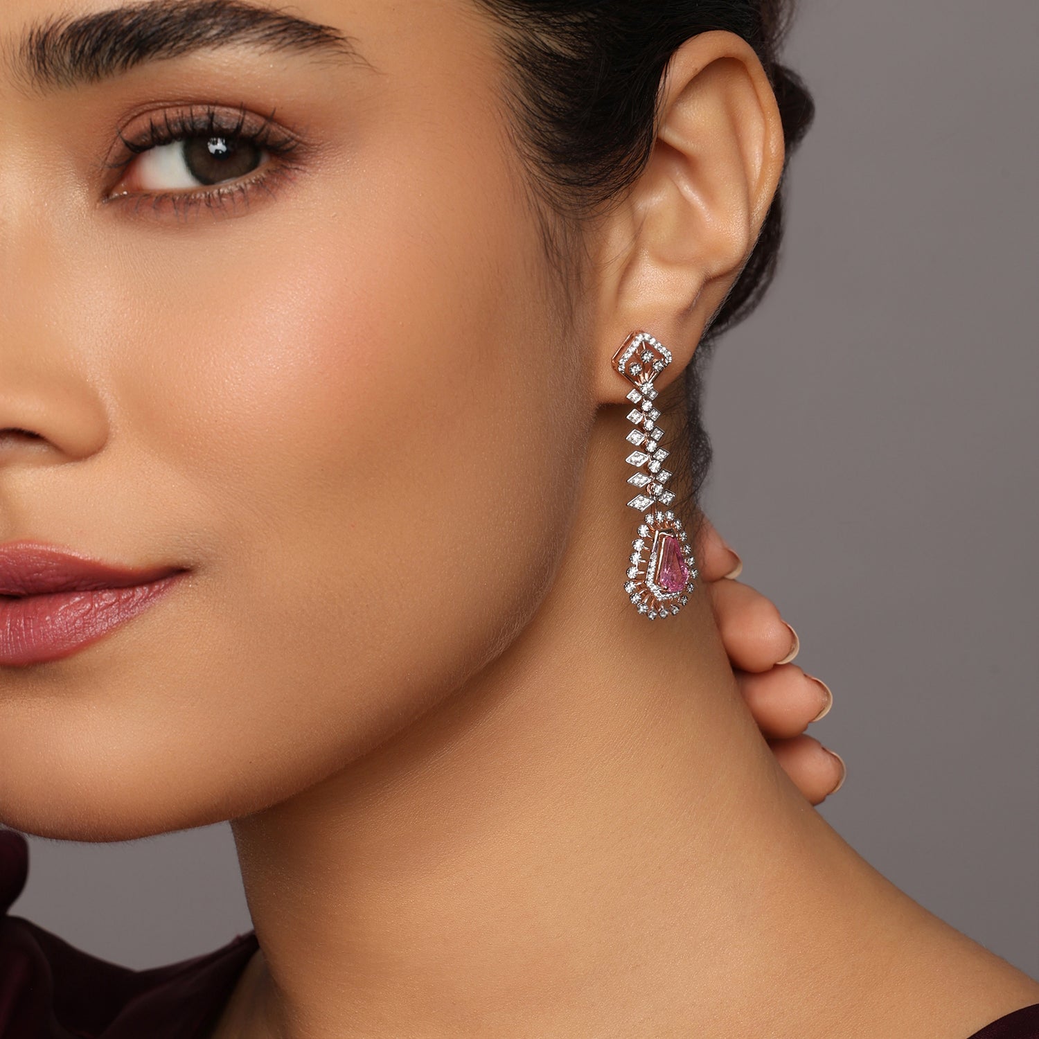 Elongated Drop Earrings with Radiant Teardrop Motif