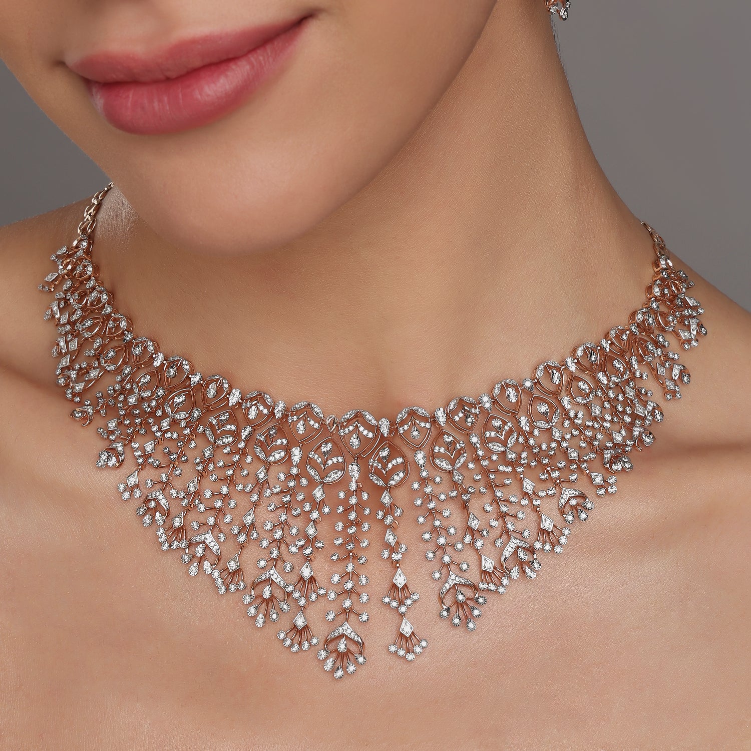 Ethereal Cascading Leaf Motif Statement Necklace With Articulated Fringe