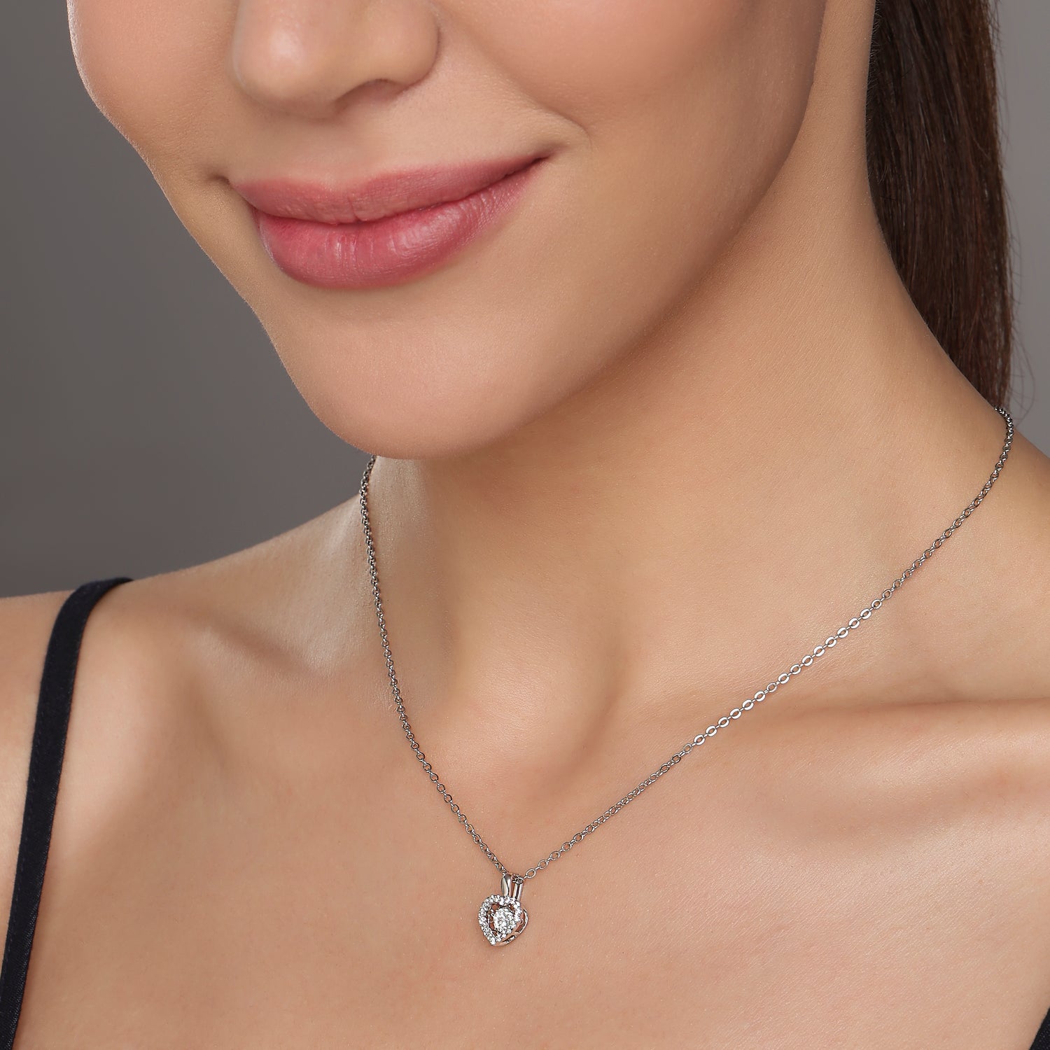 Sparkling Heart Pendant with Intricate Halo Design