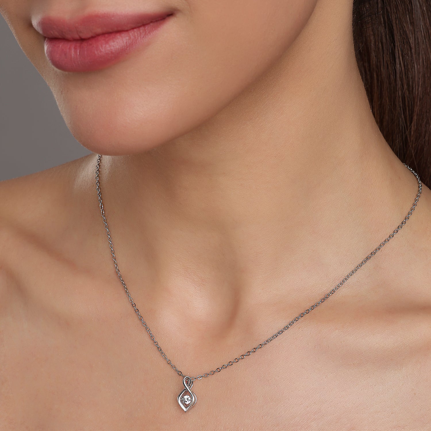 Infinity-Inspired Pendant with Central Spark Accent