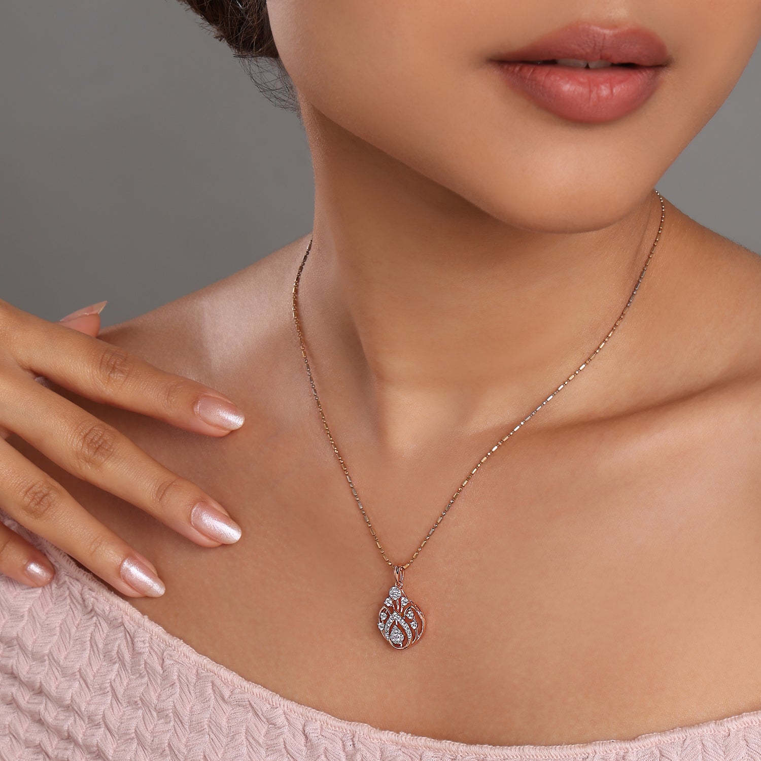 Teardrop Floral Pendant with Open Frame Design