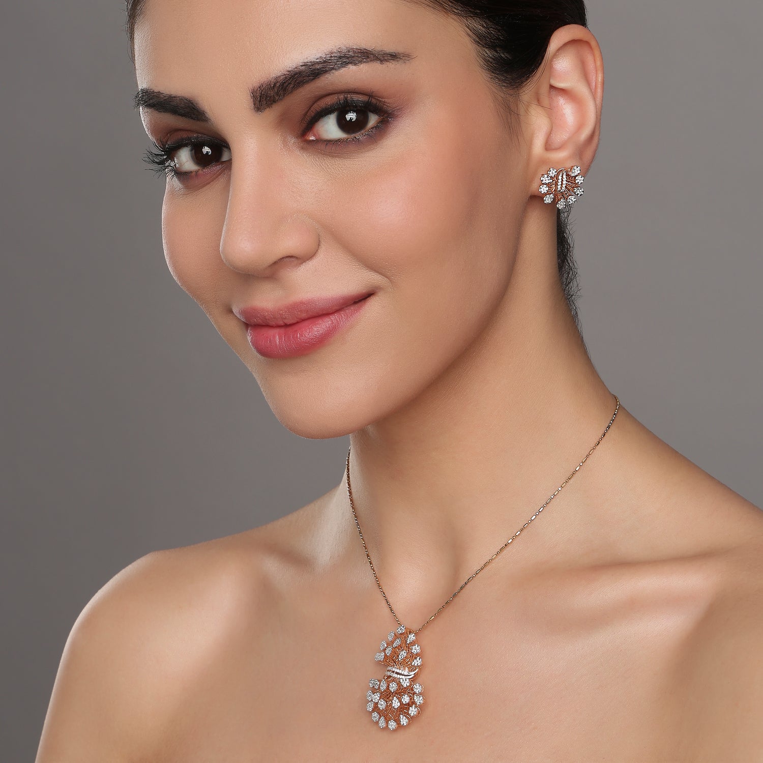 Exquisite Radiant Floral Burst Pendant And Matching Stud Earrings
