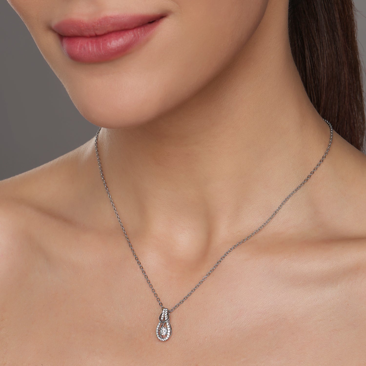 Dual-Tone Teardrop Pendant with Center Spark Accent