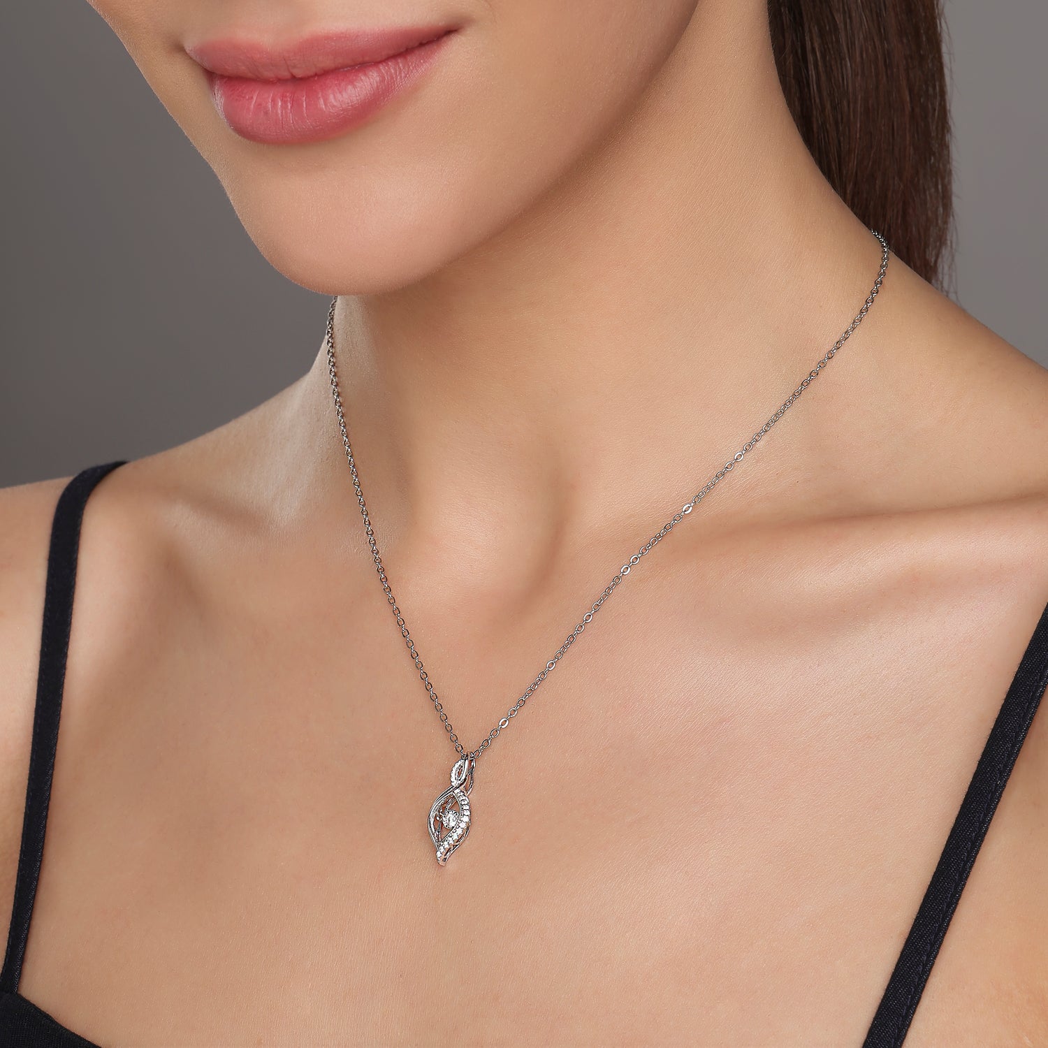 Twisted Infinity Pendant with Central Spark Accent