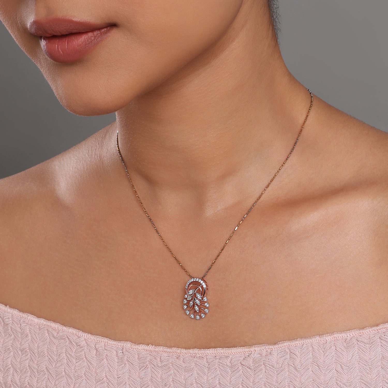 Radiant Leaf Cascade Pendant with Circular Accent