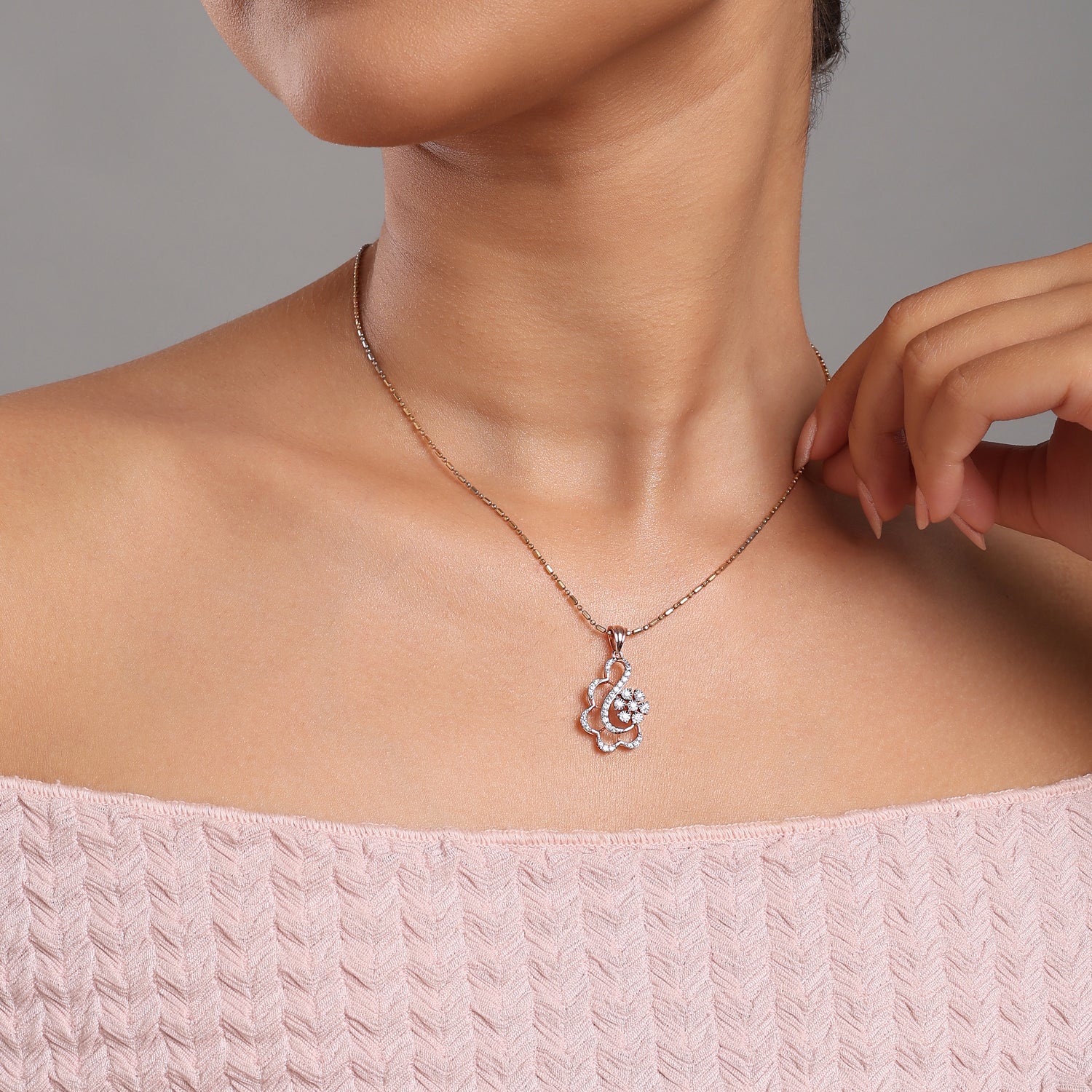 Elegant Floral Swirl Pendant with Diamond Accents