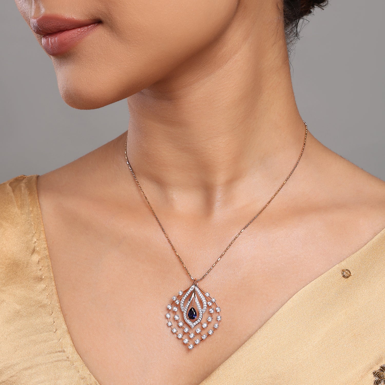 Royal Teardrop Layered Pendant with Intricate Geometric Design