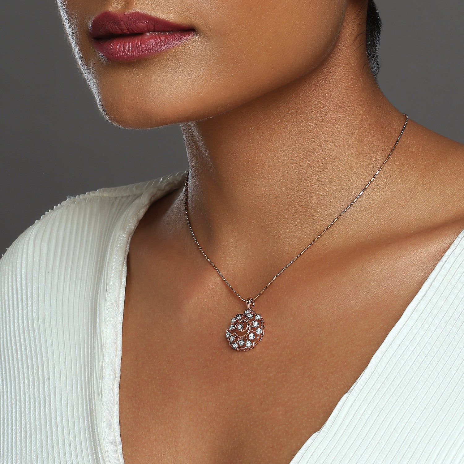 Radiant Spiral Halo Pendant with Circular Detailing