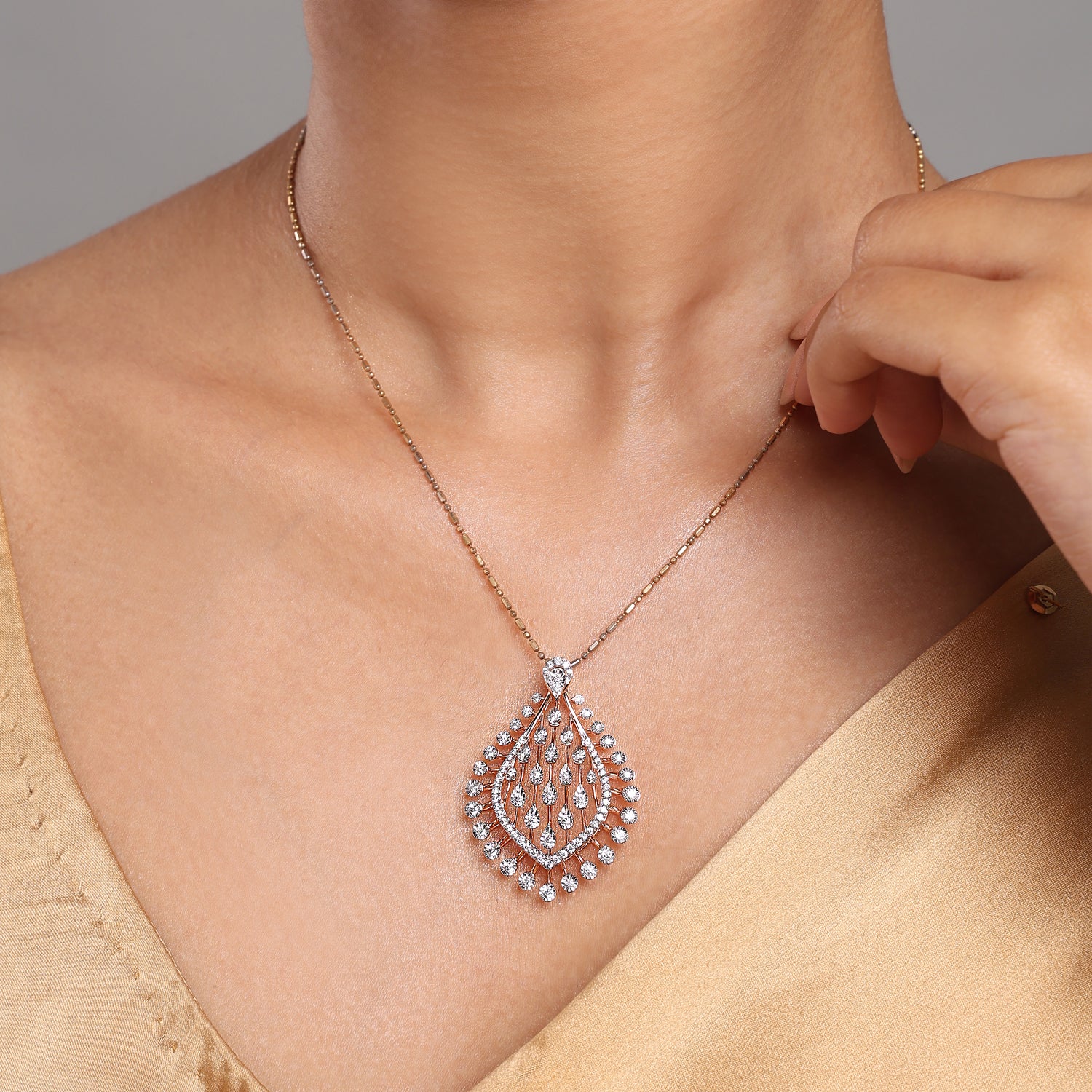 Radiant Teardrop Filigree Pendant with Cascading Detailing