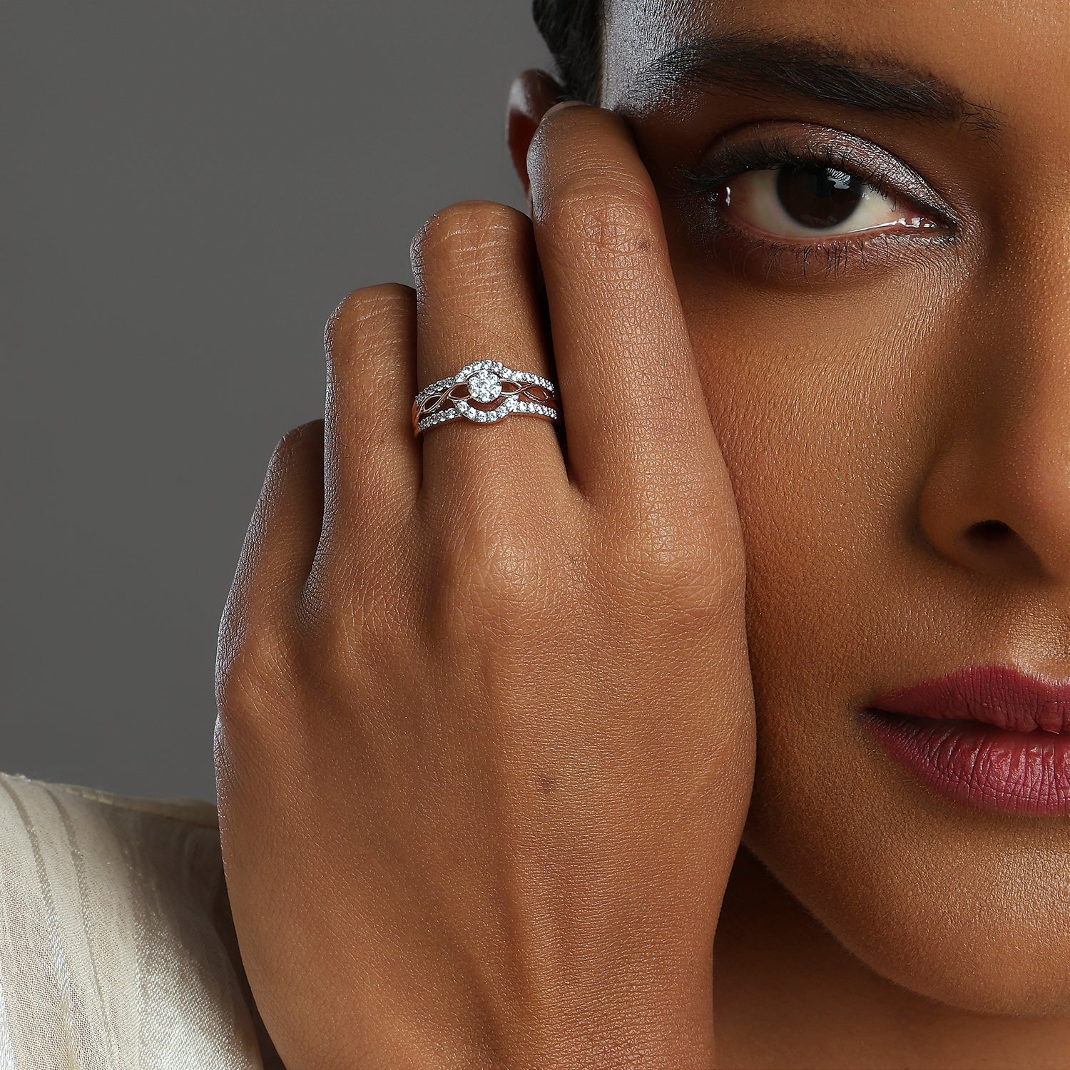 Radiant Interwoven Band Ring with Brilliant Cluster Centerpiece