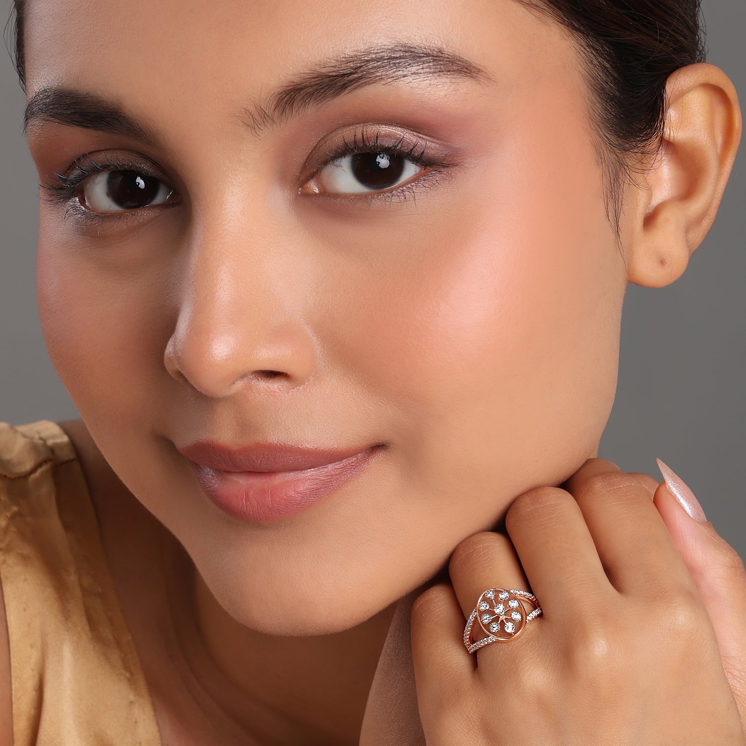 Radiant Floral Shield Ring with Brilliant Stone Embellishments
