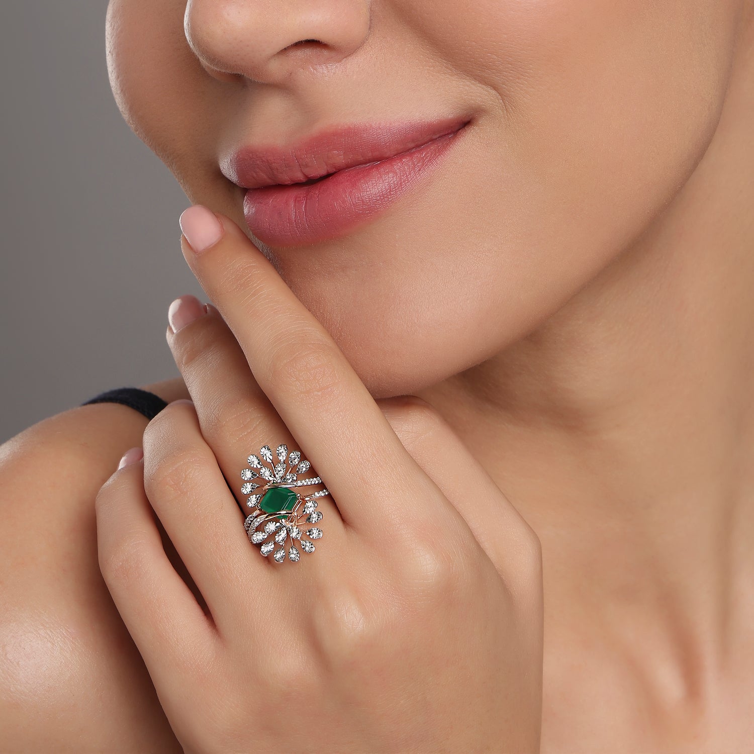Emerald Bloom Statement Ring With Radiant Petal Design