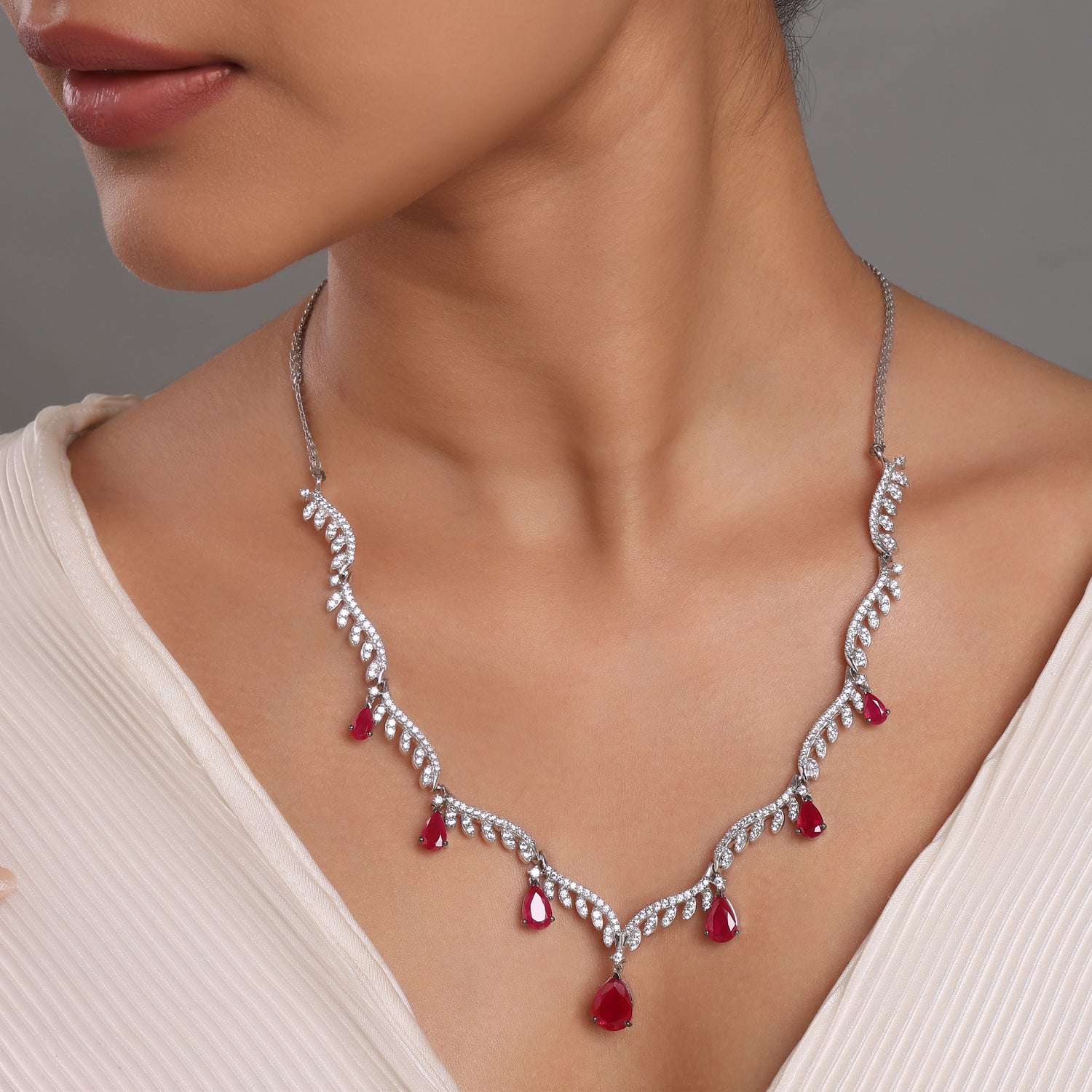 A Whispering Vine Necklace with Graceful Teardrop Dangling Accents