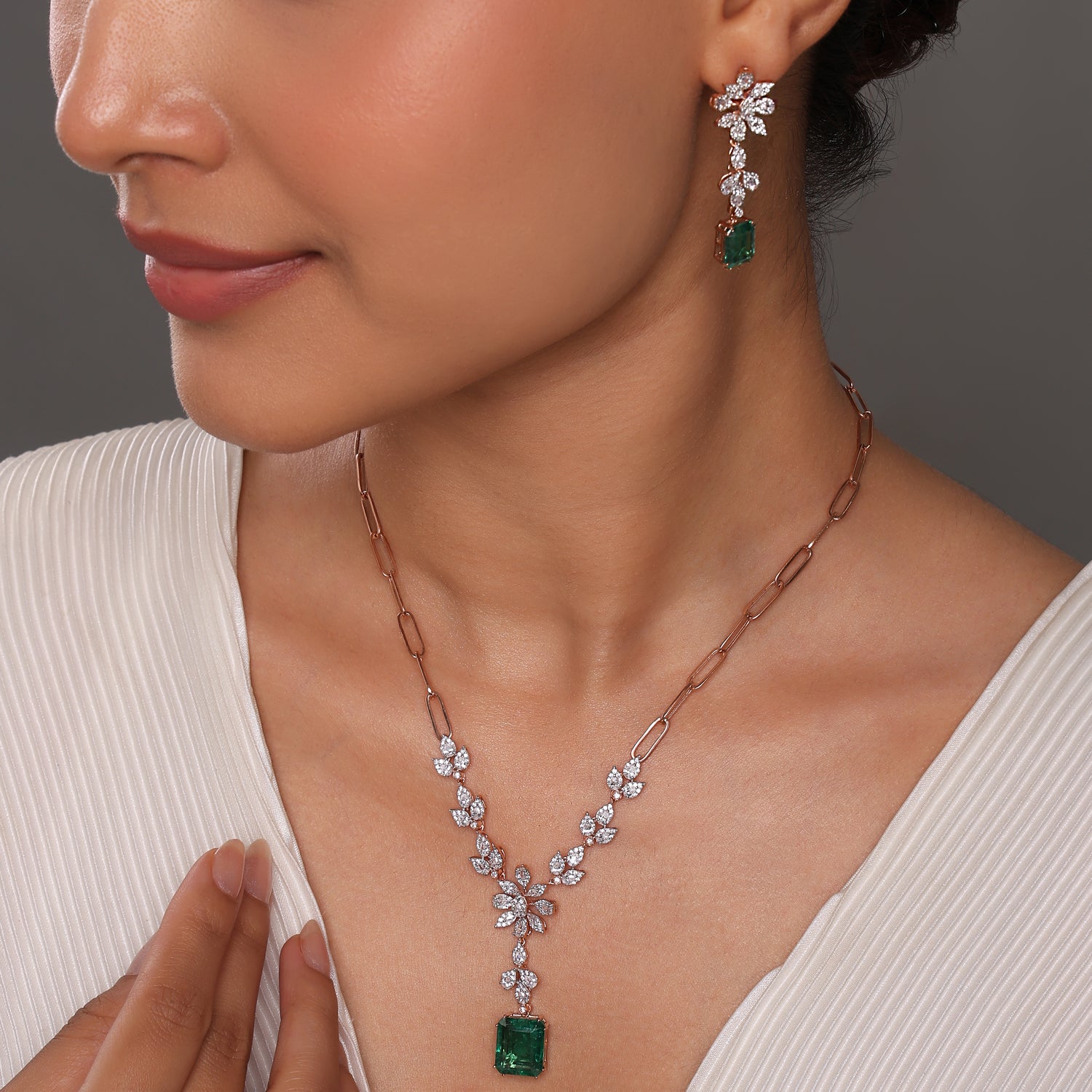Graceful Leaf Motif Emerald Cut Stone Necklace And Earring Set
