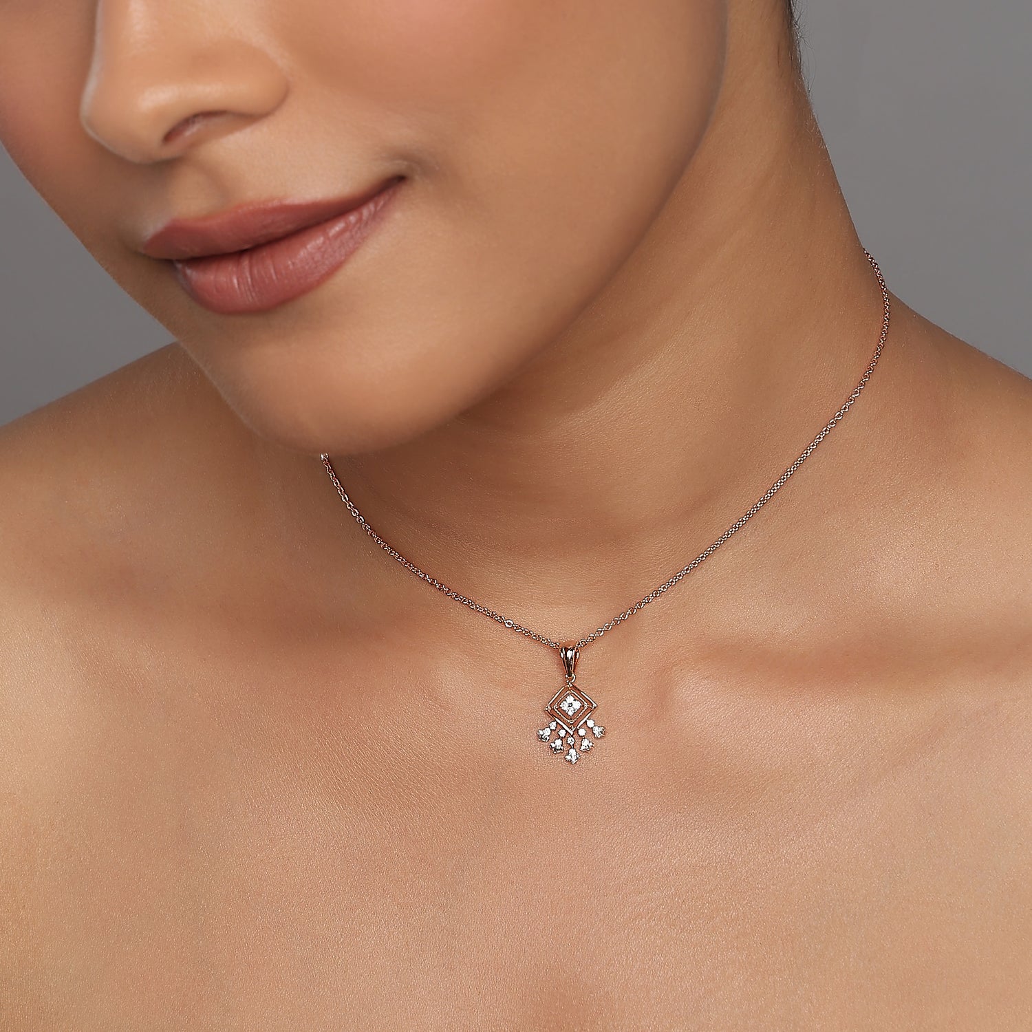 Elegant Geometric Diamond Motif Pendant With Sparkling Floral Droplet Accents