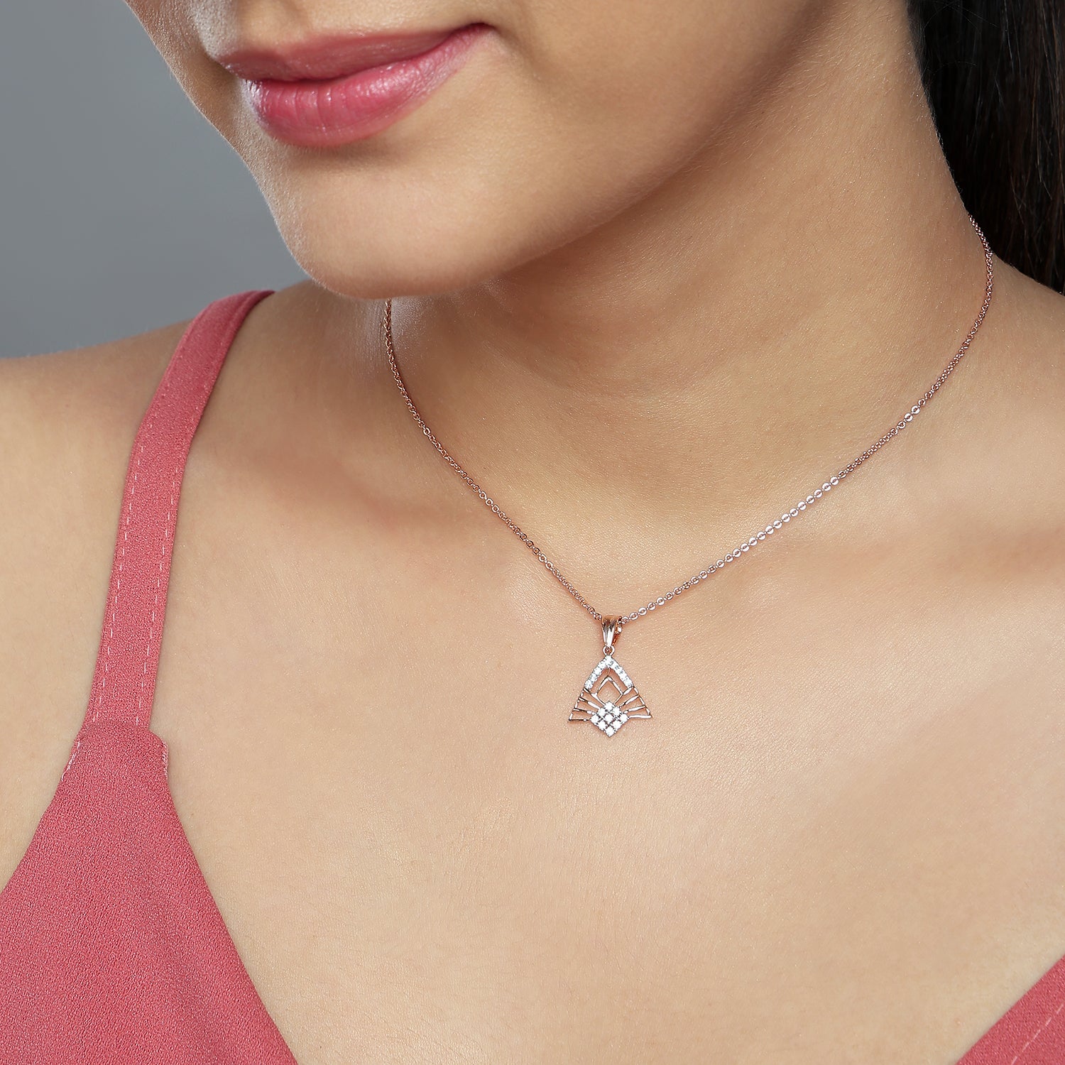 Radiant Geometric Triangle Pendant With Modern Statement Elegance