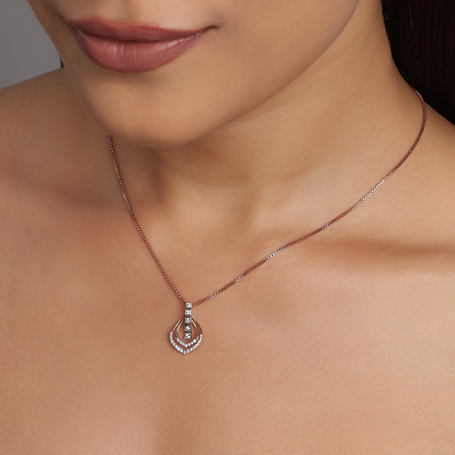 Elegant Double Teardrop Pendant With Shimmering Geometric Accents