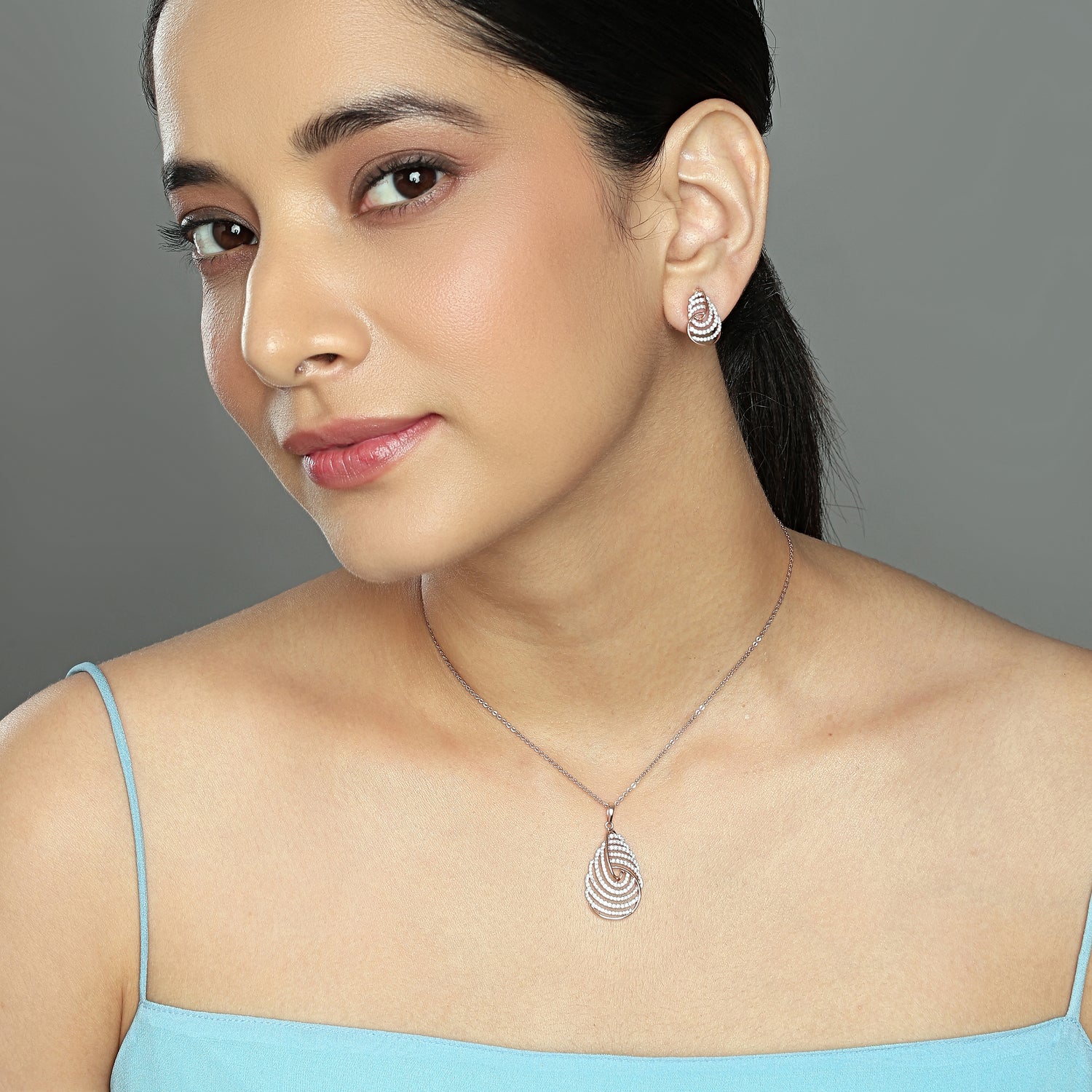 Graceful Swirling Teardrop Pendant and Matching Earrings for Timeless Elegance