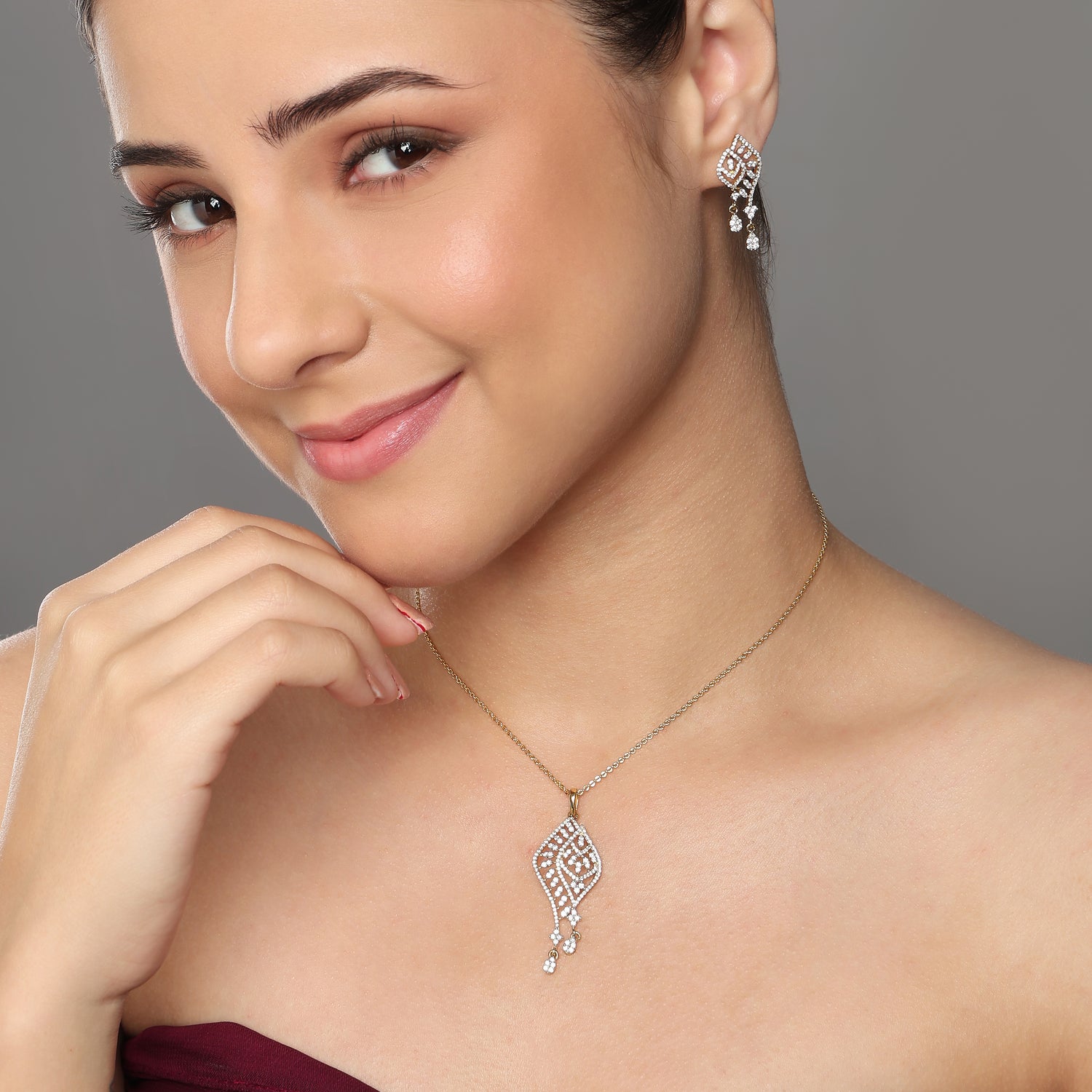 Elegantly Crafted Floral Teardrop Pendant and Matching Dangle Earring Set