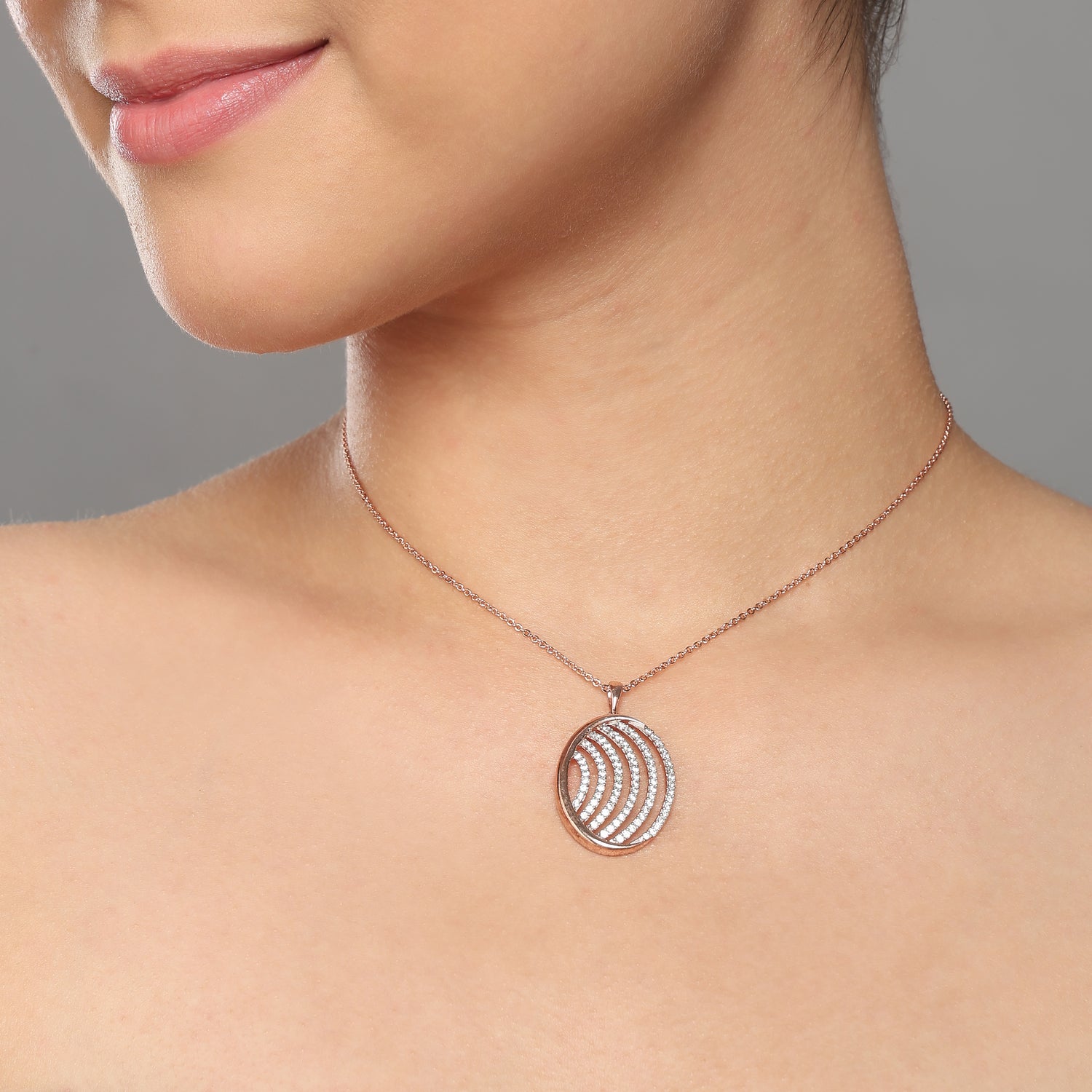 Sleek Oval Wave Pendant with Modern Layered Flow