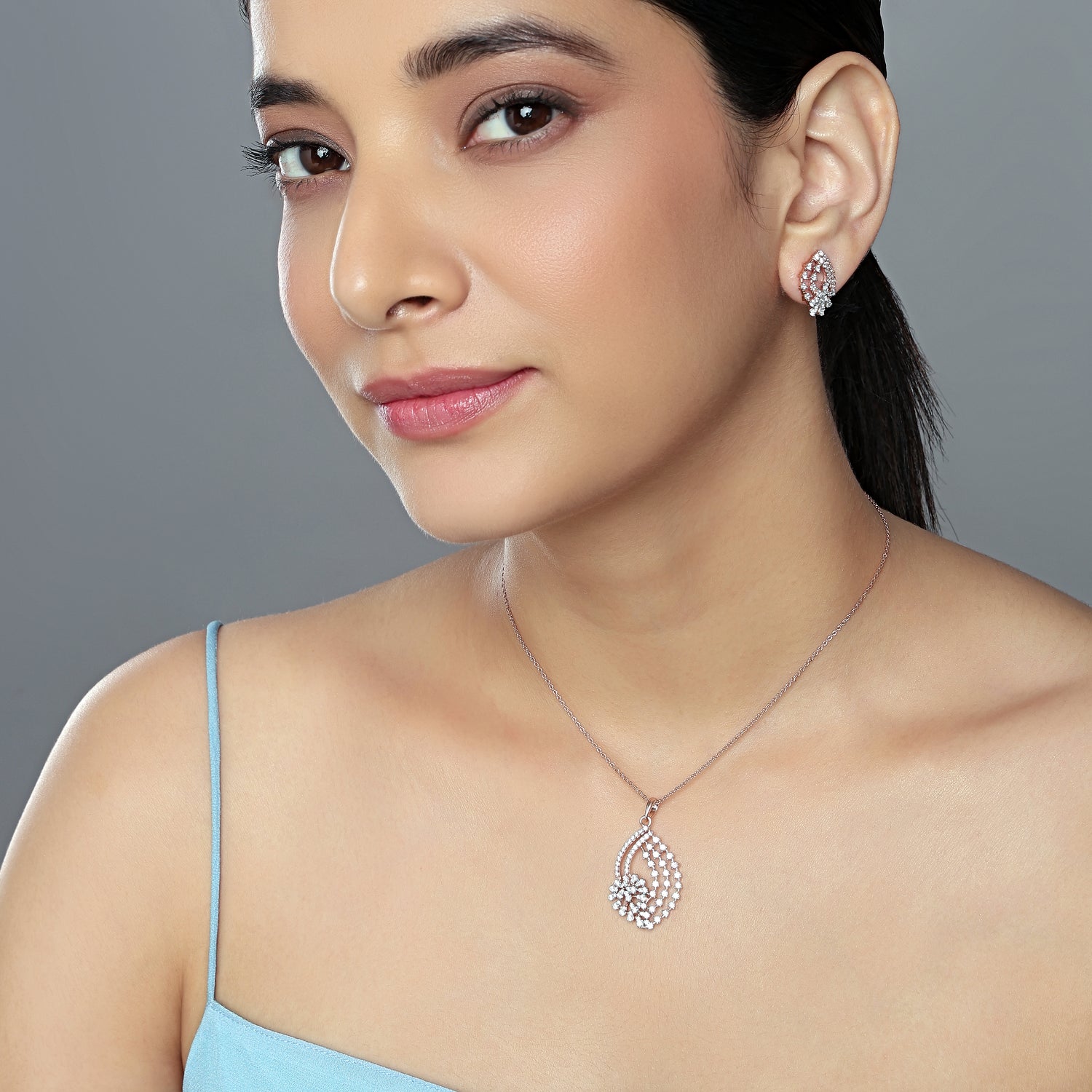 Elegance Personified Swirling Floral Pendant and Stud Earrings Jewelry Set