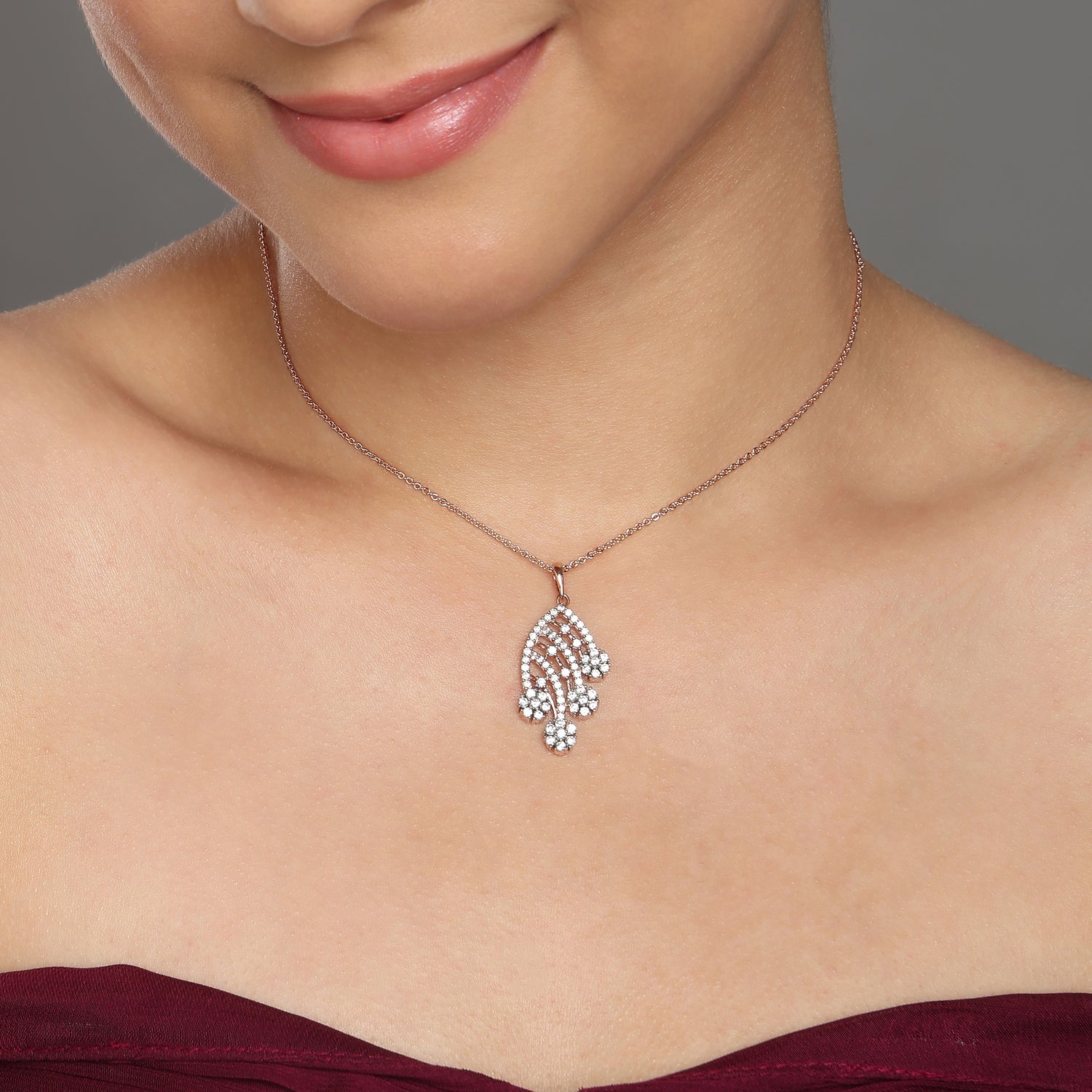 Flowing Leaf Drop Pendant with Clustered Floral Accents