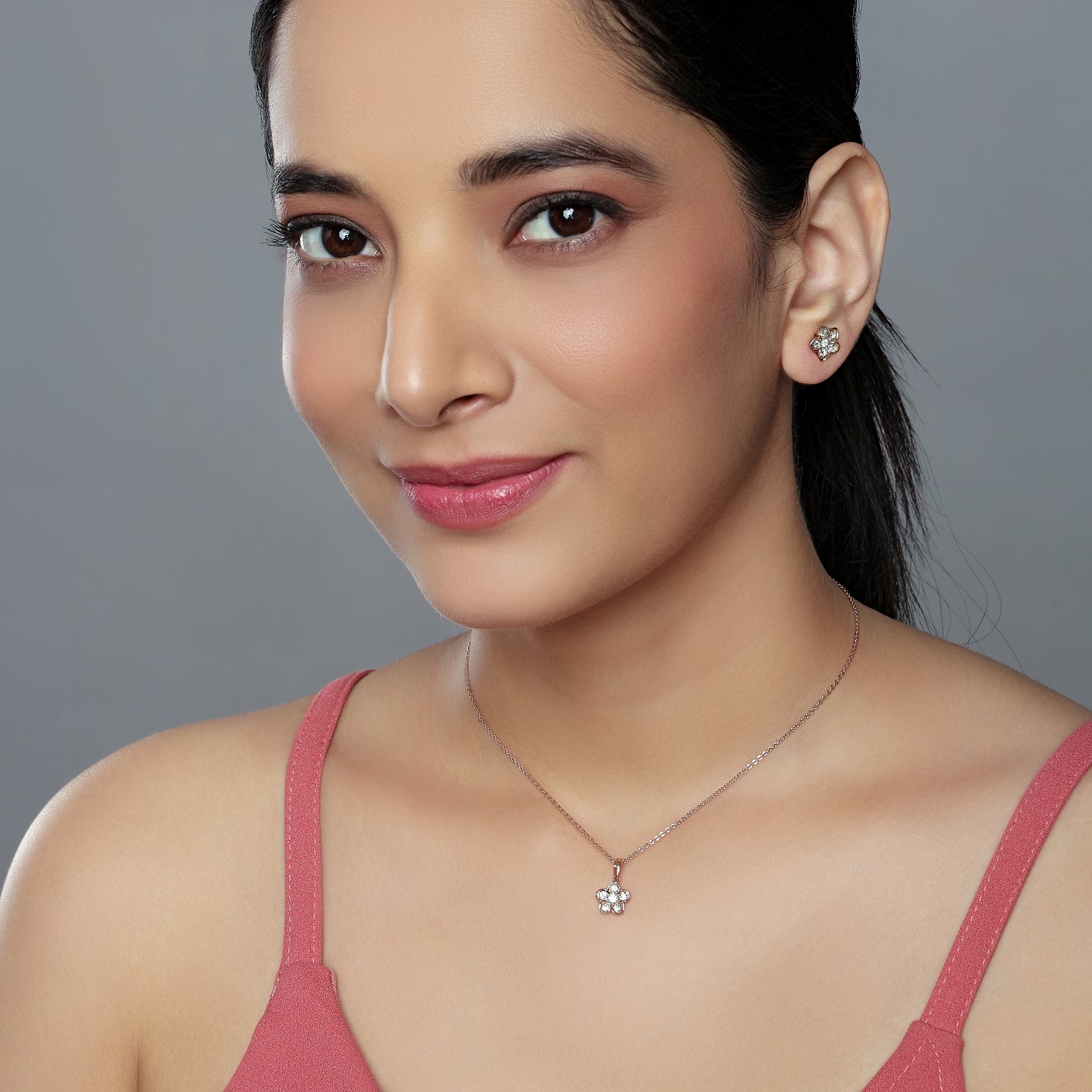 Radiant Floral Blossom Pendant and Matching Stud Earring Set