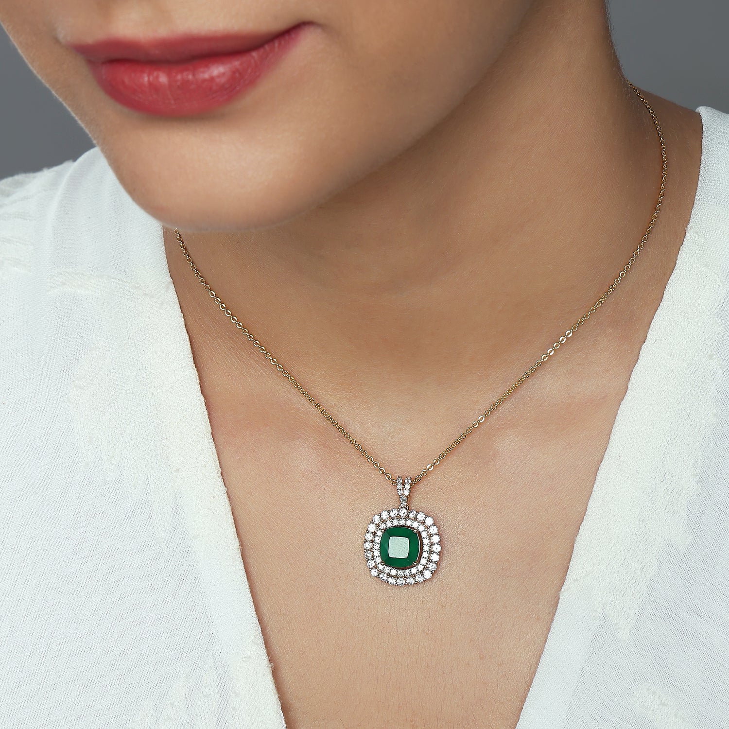 A Majestic Cushion Halo Pendant with Refined Grandeur