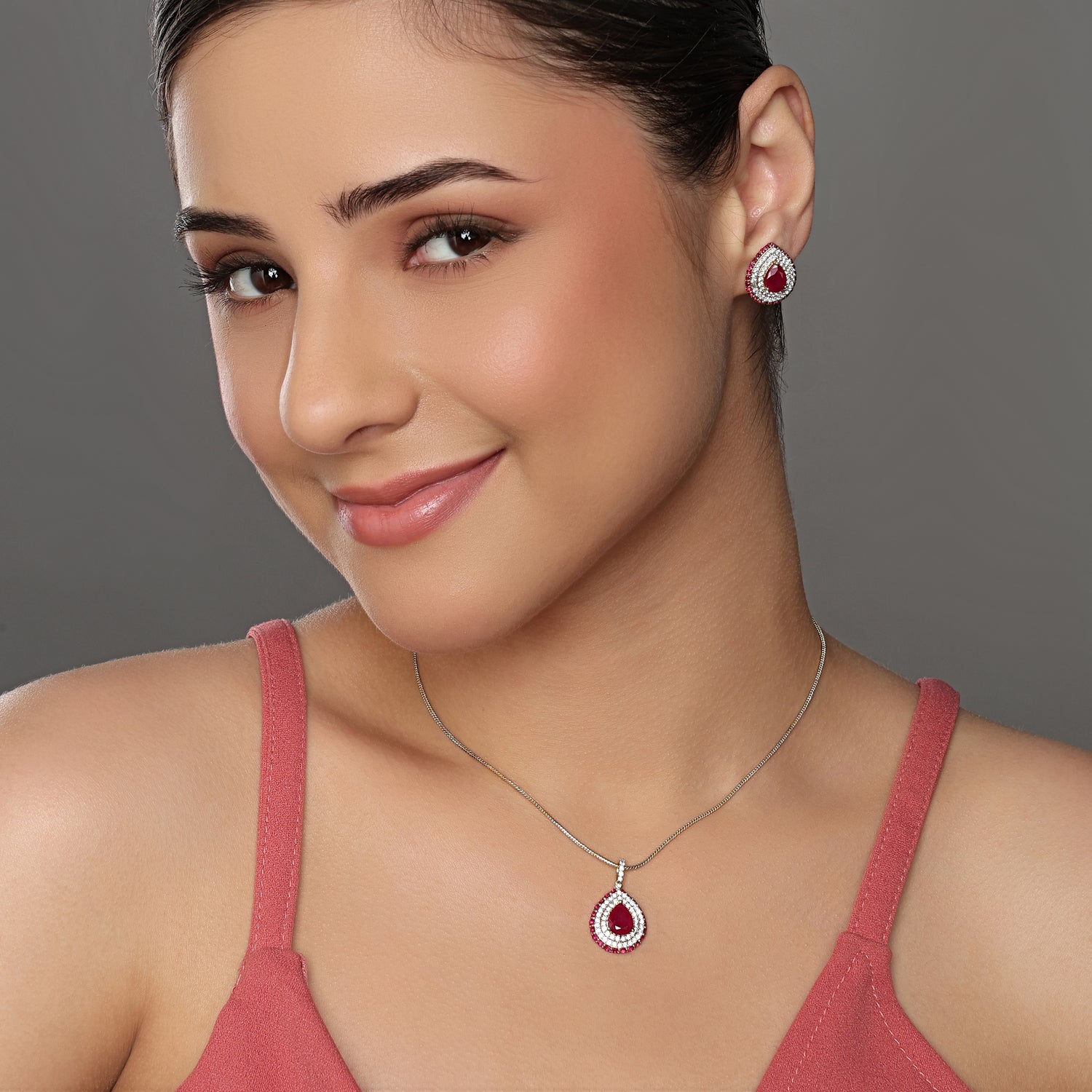Elegant Pear Cut Crimson Halo Pendant and Stud Earring Set