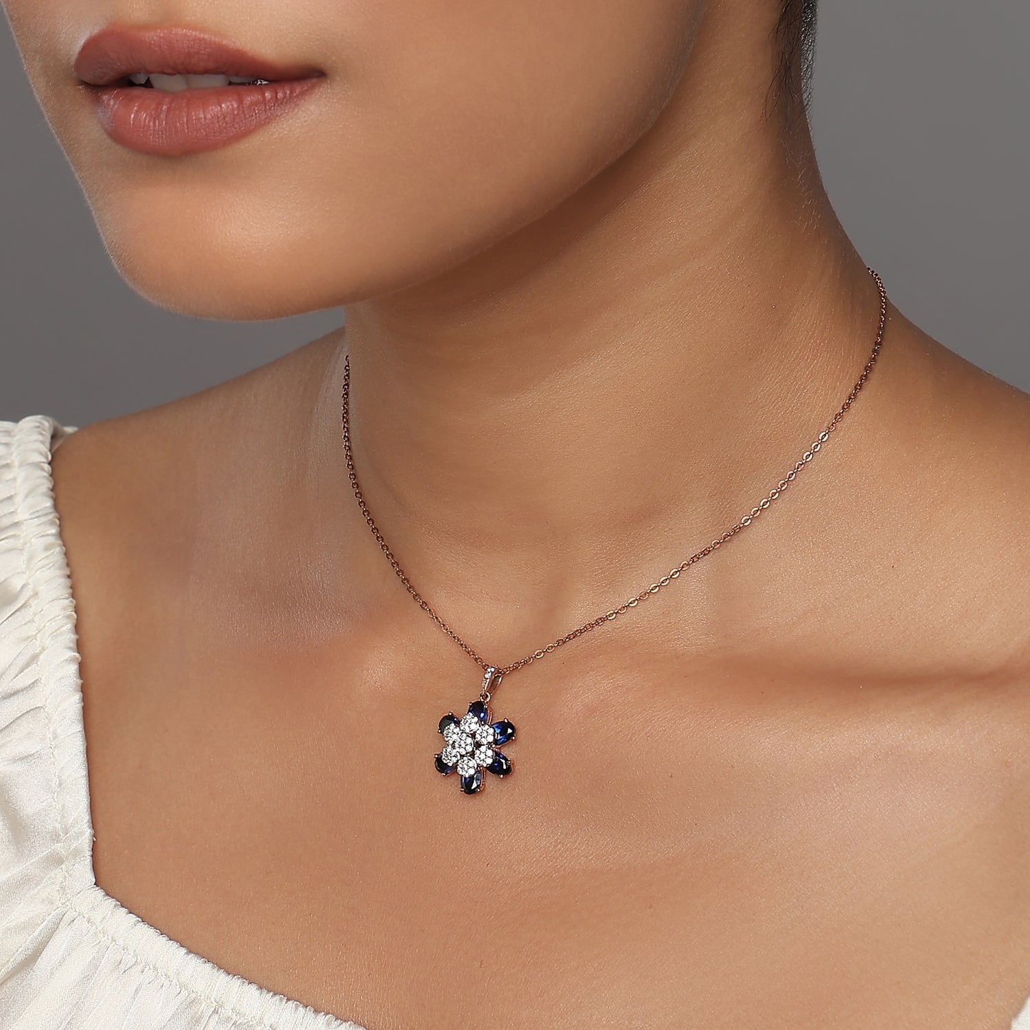 Elegant Floral Starburst Pendant Featuring Brilliant Center Pave And Petals