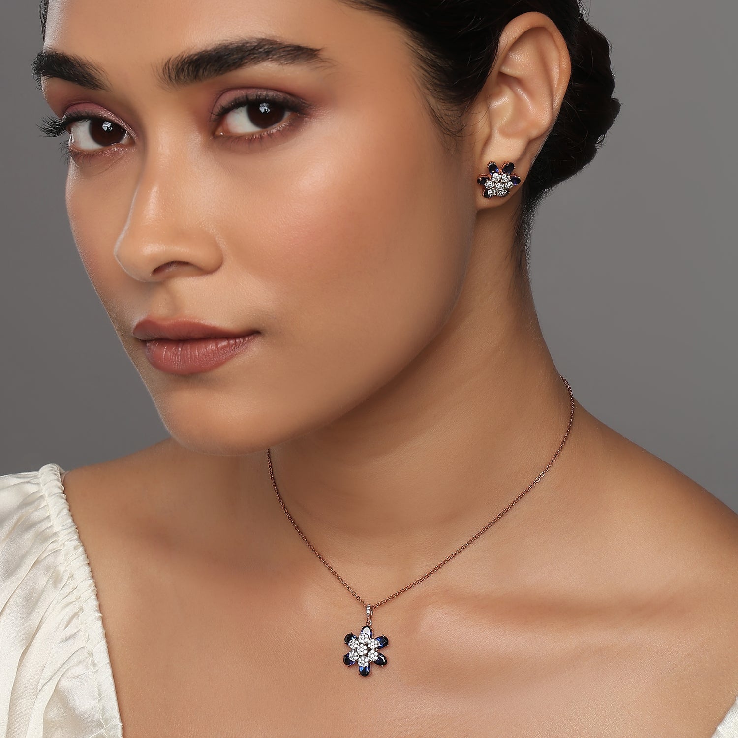 Enchanting Floral Bloom Pendant and Matching Stud Earring Set