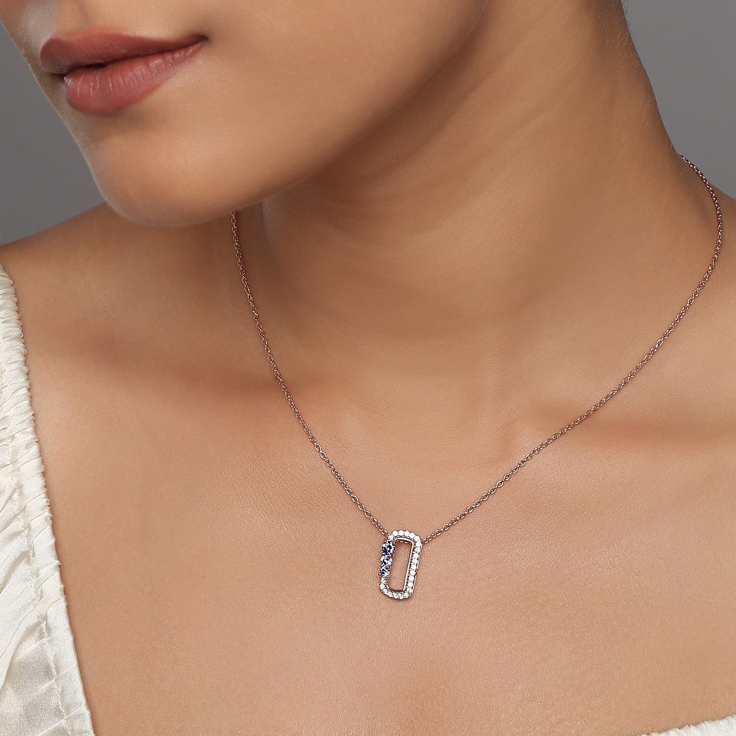 Elegant Geometric Open Rectangle Pendant with Radiant Accent Stones