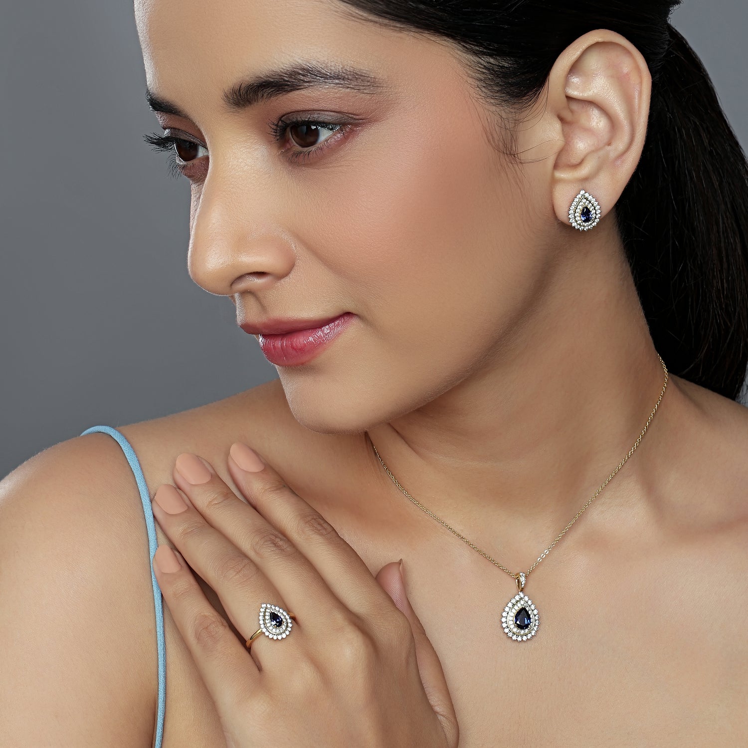 Enchanting Deep Blue Teardrop Halo Pendant, Earring and Ring Set