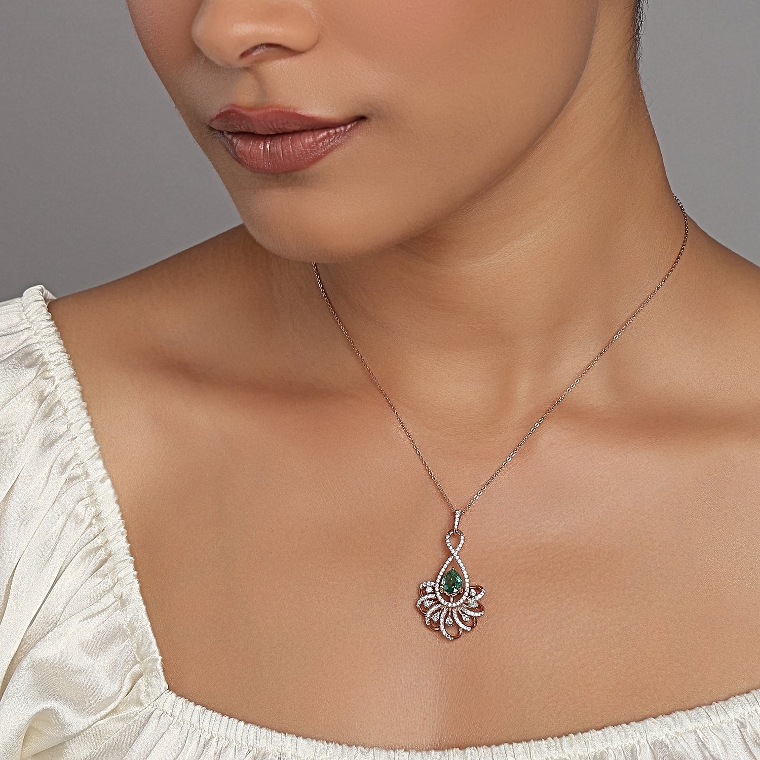 Radiant Pear Cut Gemstone Pendant With Intricate Floral Diamond Halo