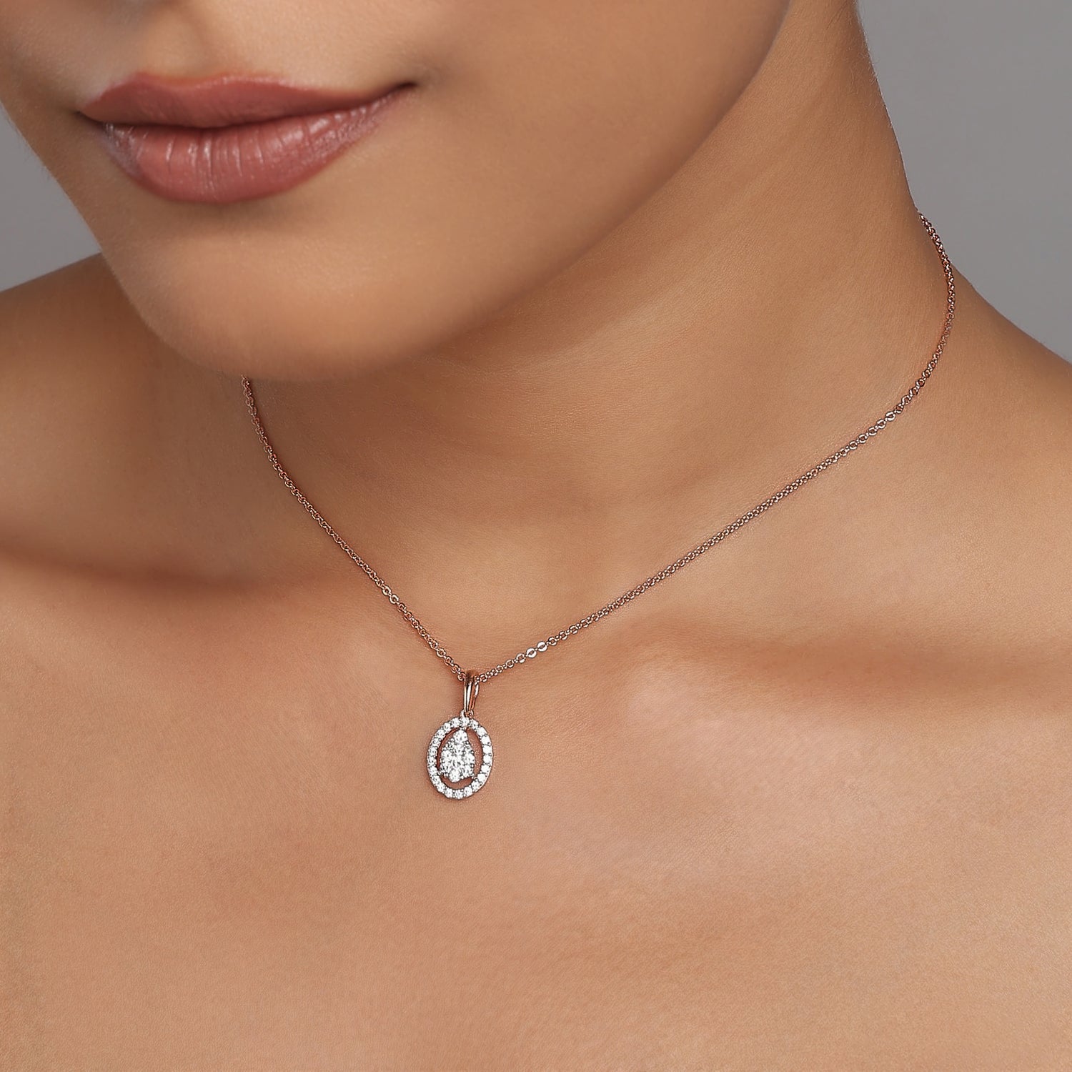 Elegant Rose Radiance Pear Cluster Pendant With Sparkling Halo Frame