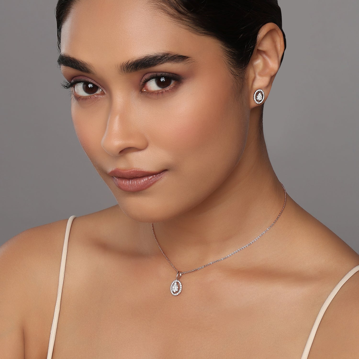 Elegant Pear Cut Cluster Pendant and Stud Earring Set