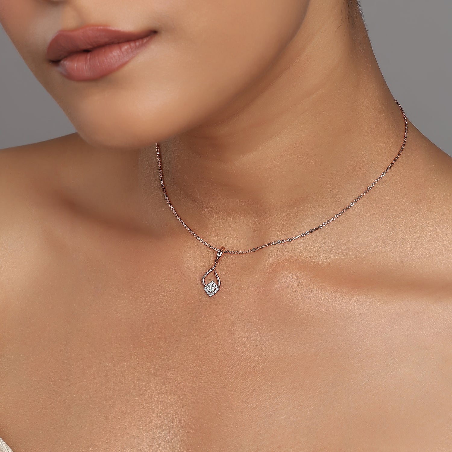 Elegant Swirl Open Teardrop Pendant With Radiant Pave set Diamond