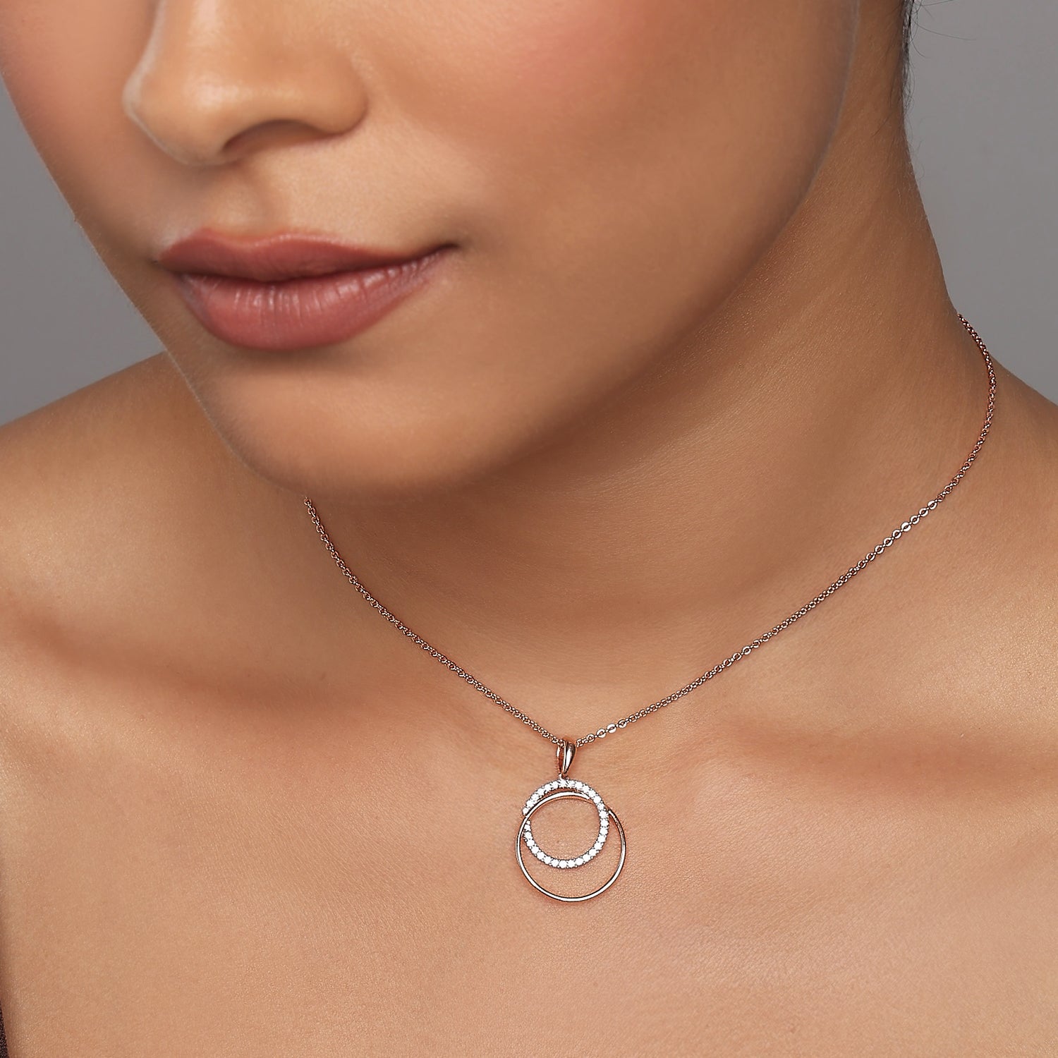 Elegant Interlocking Double Circle Pendant With Shimmering Pave Set Accents